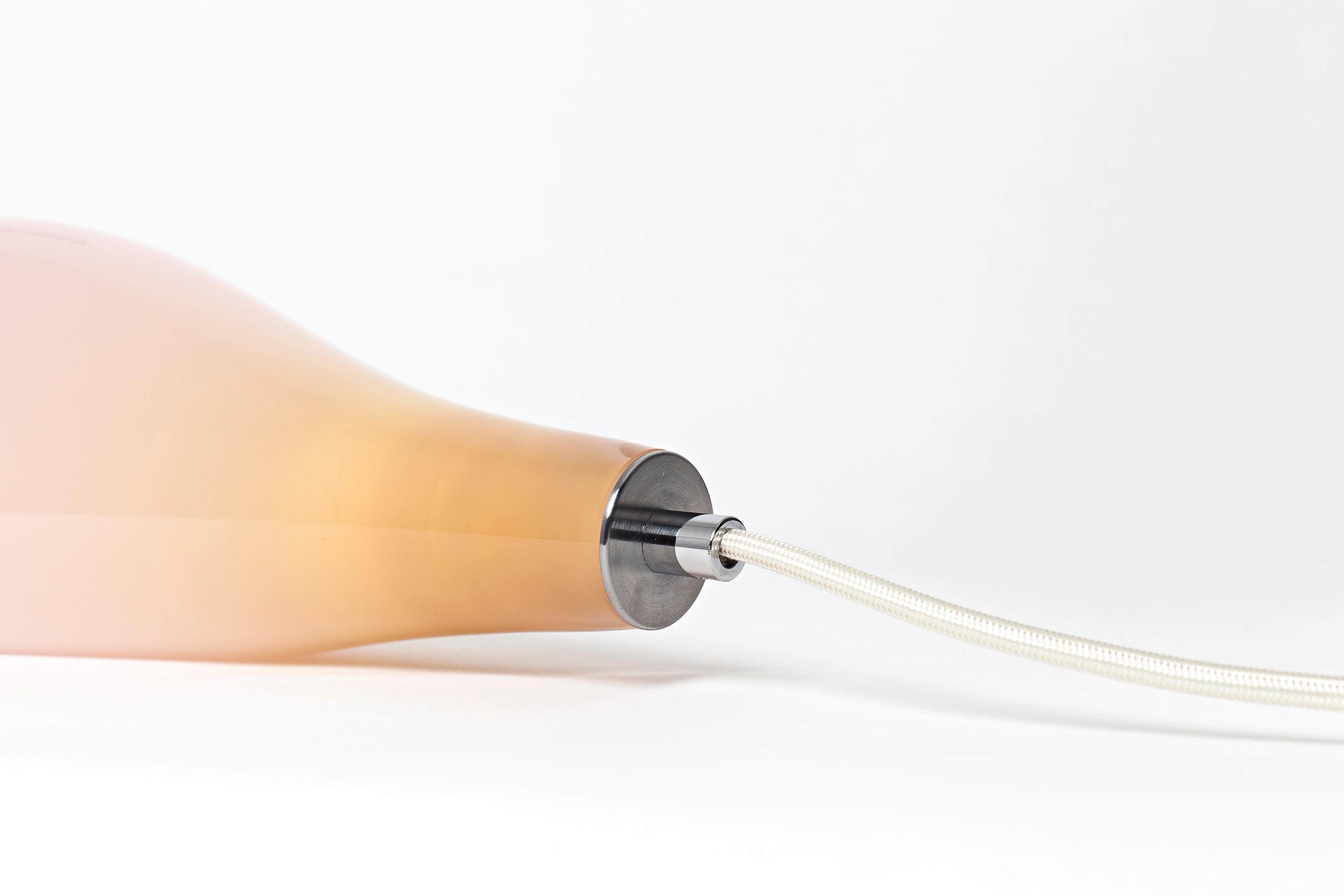 Leech is the result of a relationship of mutual benefit that blurs the boundary between an object and a living organism. The leech-like glass lamp is mouth blown in Sweden, designed to embrace all the natural and organic qualities of the mouth blown
