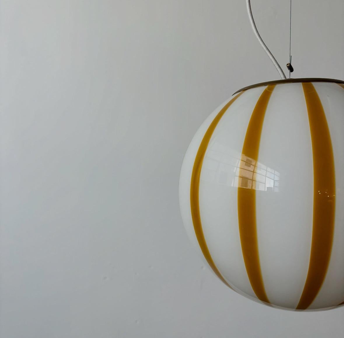 Mouth blown Murano amber stripes pendant lamp, made in Murano island, Italy For Sale 3