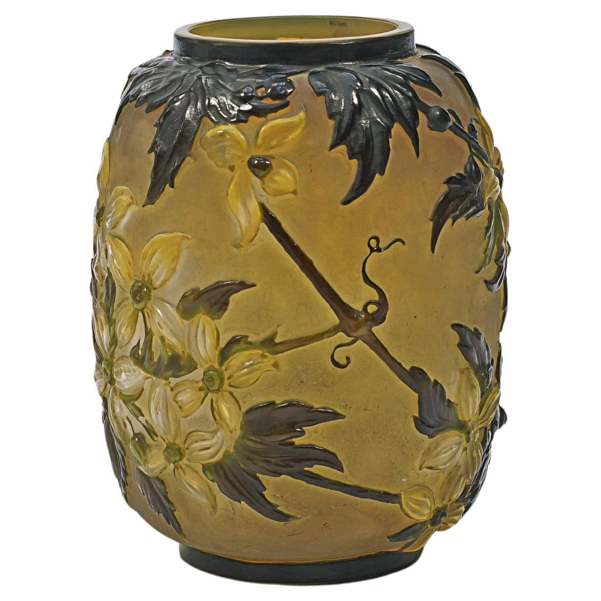 Mouth-blown vase with clematis flowers by Émile Gallé