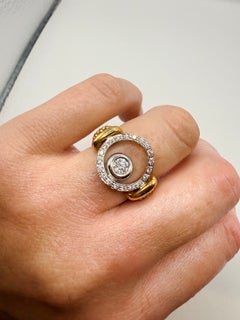 Movable flex ring with diamonds in 18KT gold