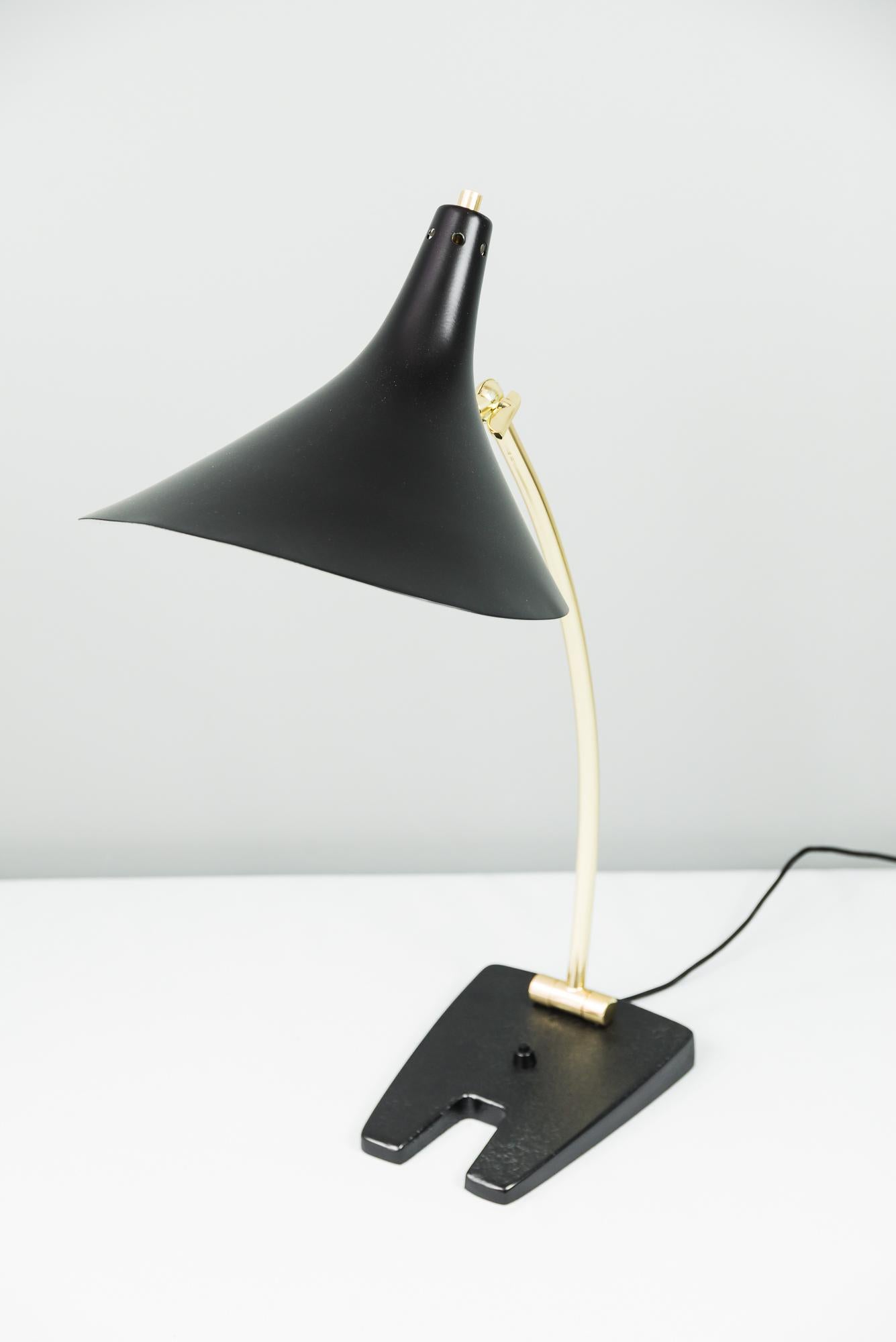Movable table lamp, Italy, circa 1960s
Brass polished and stove enamelled
Metal (painted)
Measure: Deep (tilted) 66cm.
