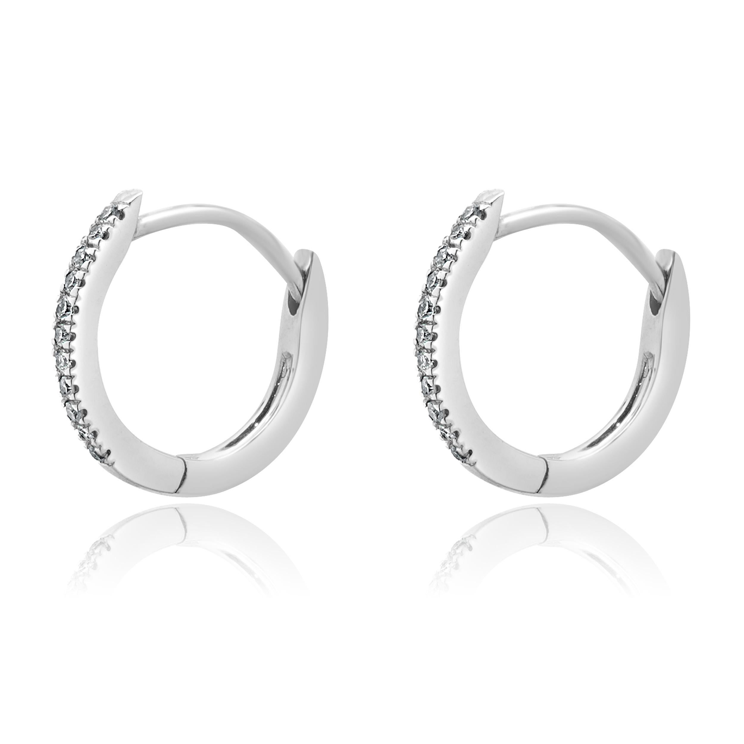 Designer: Movado
Material: 14k white gold
Diamond: 22 round cut = 0.10cttw
Dimensions: earrings measure approximately 10.8mm x 1.2mm
Weight: 1.15 grams
