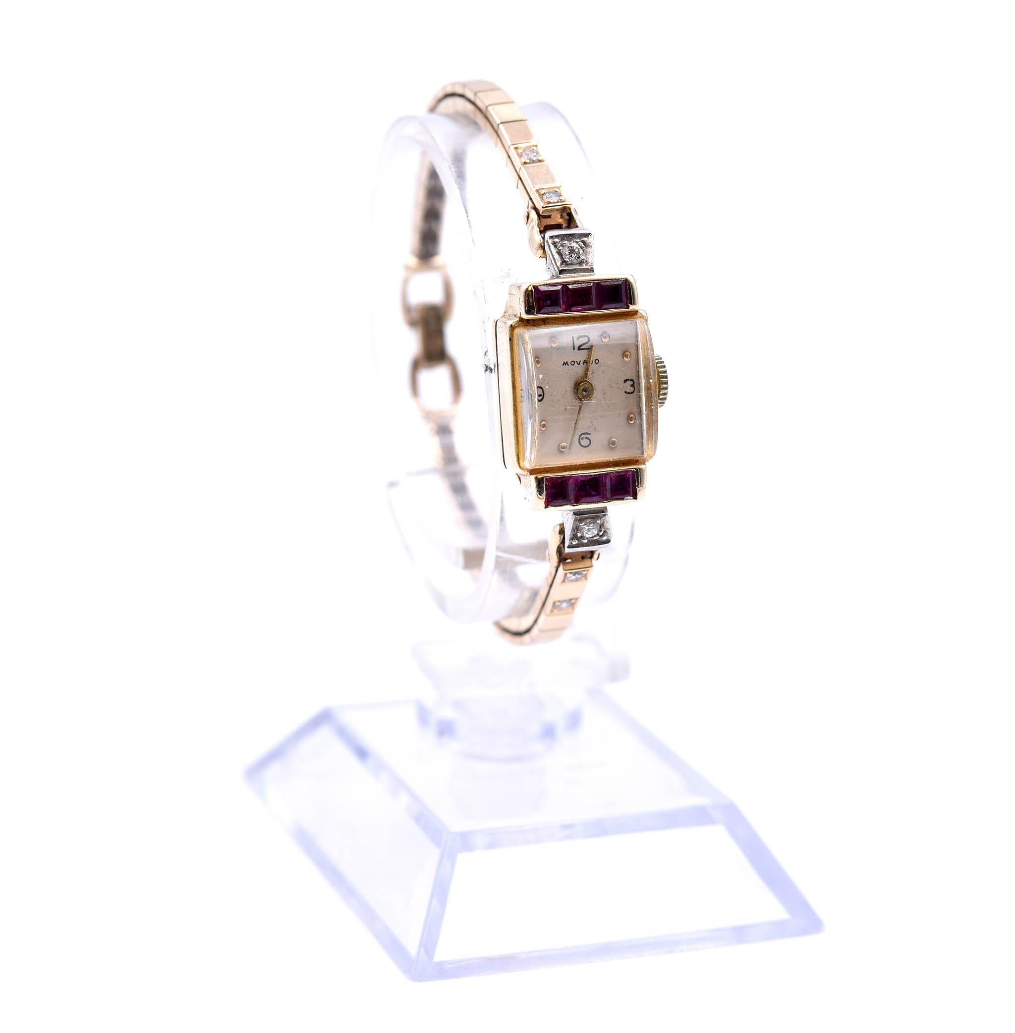 Movement: manual wind 17 jewels
Function: hours, minutes
Case: rectangle 19.66mm by 12.82mm 14k yellow gold case with diamond bezel, plastic crystal, pull/push crown
Dial: white dial with Arabic numbers, gold toned hands 
Bracelet: 14k yellow gold