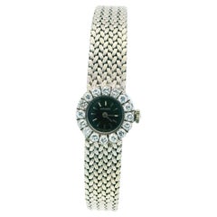 Reloj Movado de mujer con bisel de malla de oro blanco de 18 quilates y diamantes