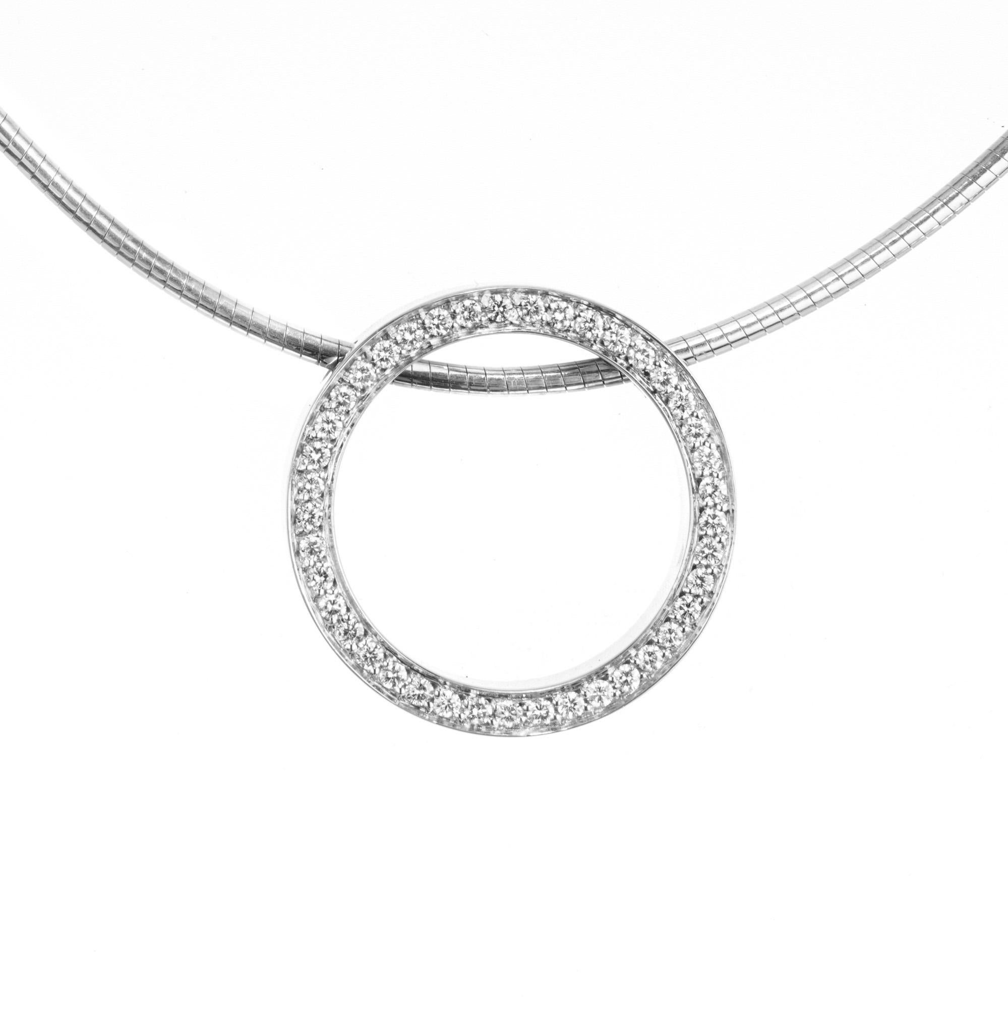 Classic Movado solid 18k white gold circle diamond pendant on a sleek round snake chain with a current total length of 18.25 inches. Set with 41 round brilliant cut diamonds, this simple, stylish, and timeless necklace is the perfect everyday piece