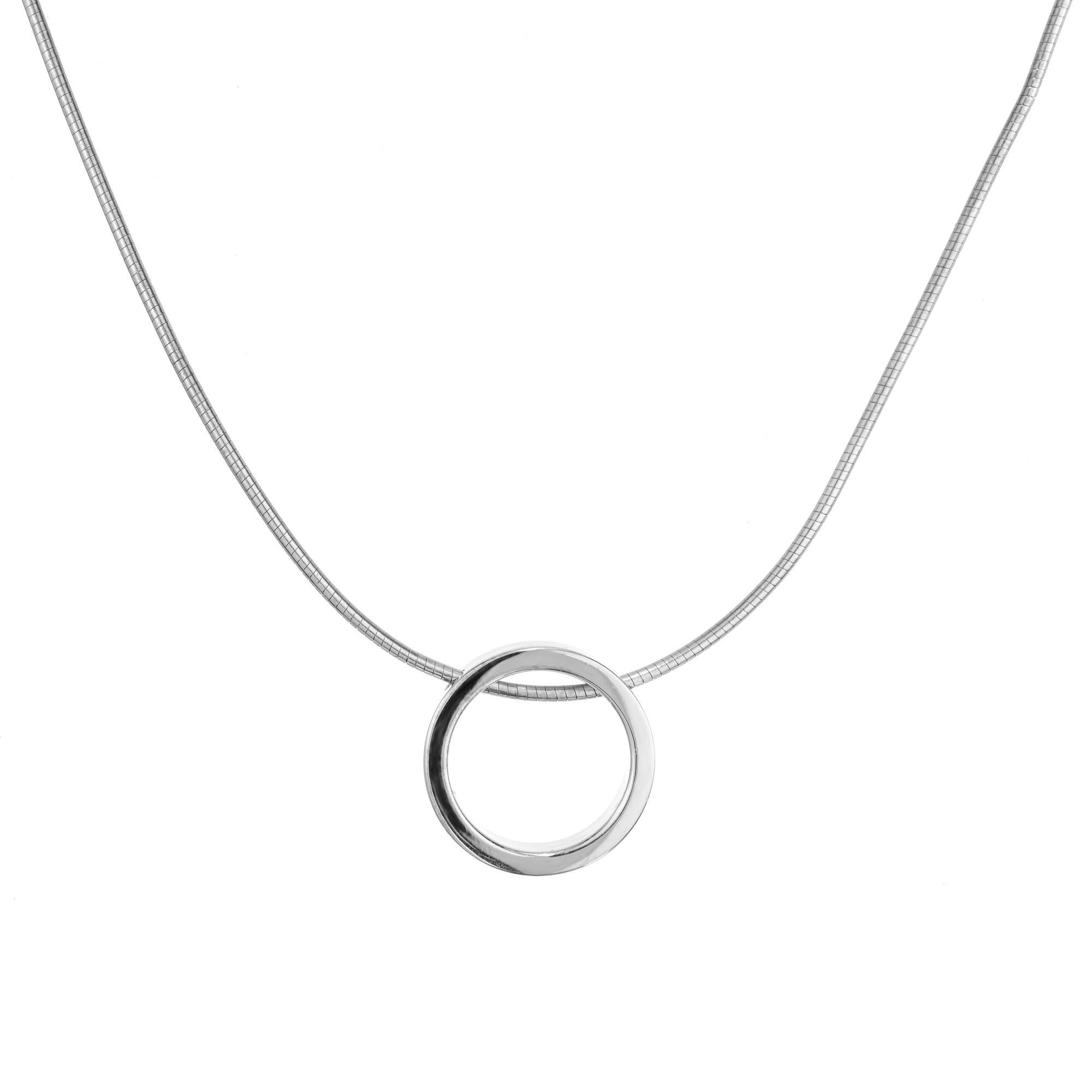 Movado .20 Carat Round Diamond White Gold Circle Pendant Necklace In Excellent Condition For Sale In Stamford, CT