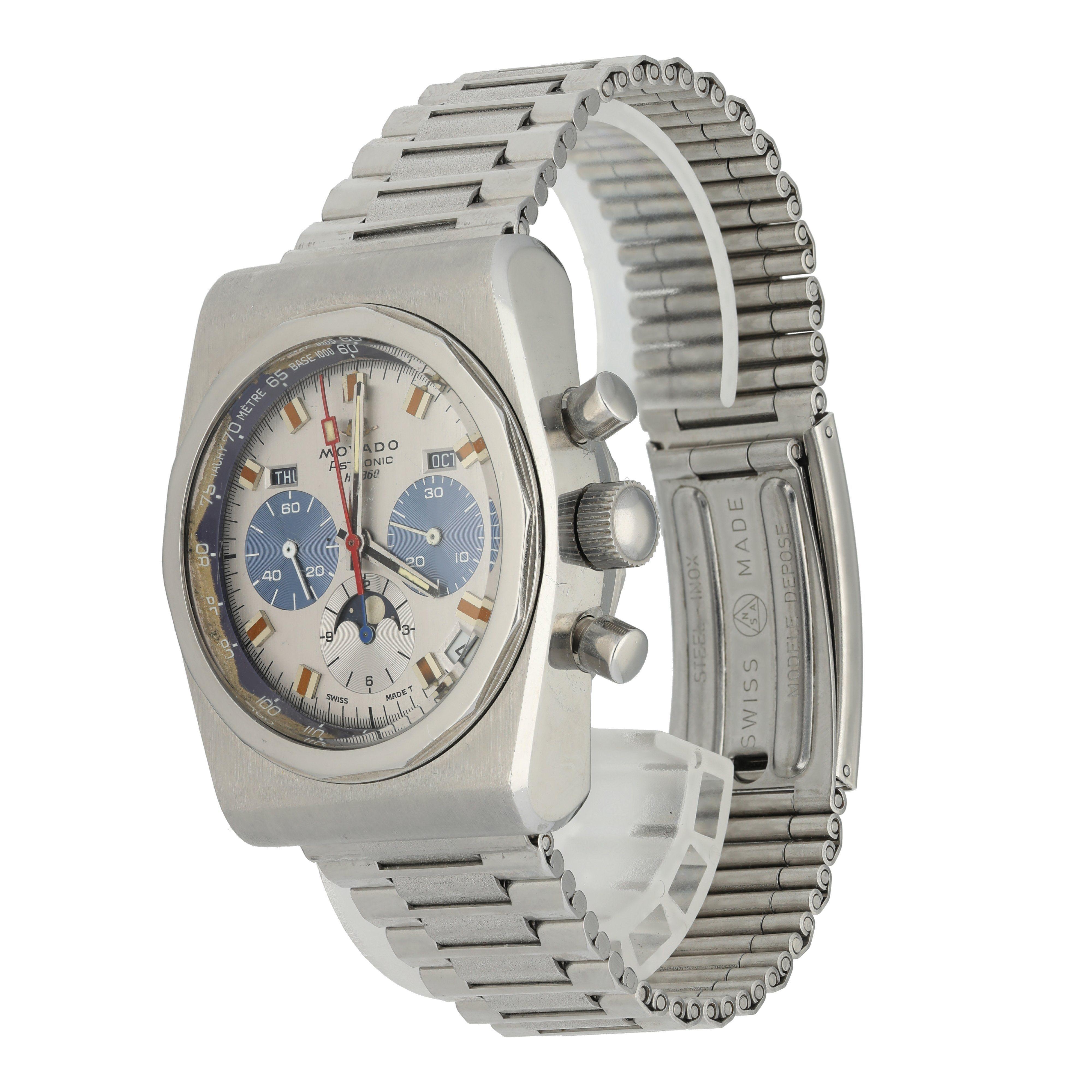  Movado Astronic HS 360 Chronograph Vintage Men's Watch.
 38mm Stainless Steel case. 
 Stainless Steel Stationary bezel. 
 Silver dial with steel hands and index hour markers. 
 Minute markers on the outer dial. 
 Date display between the 4 & 5