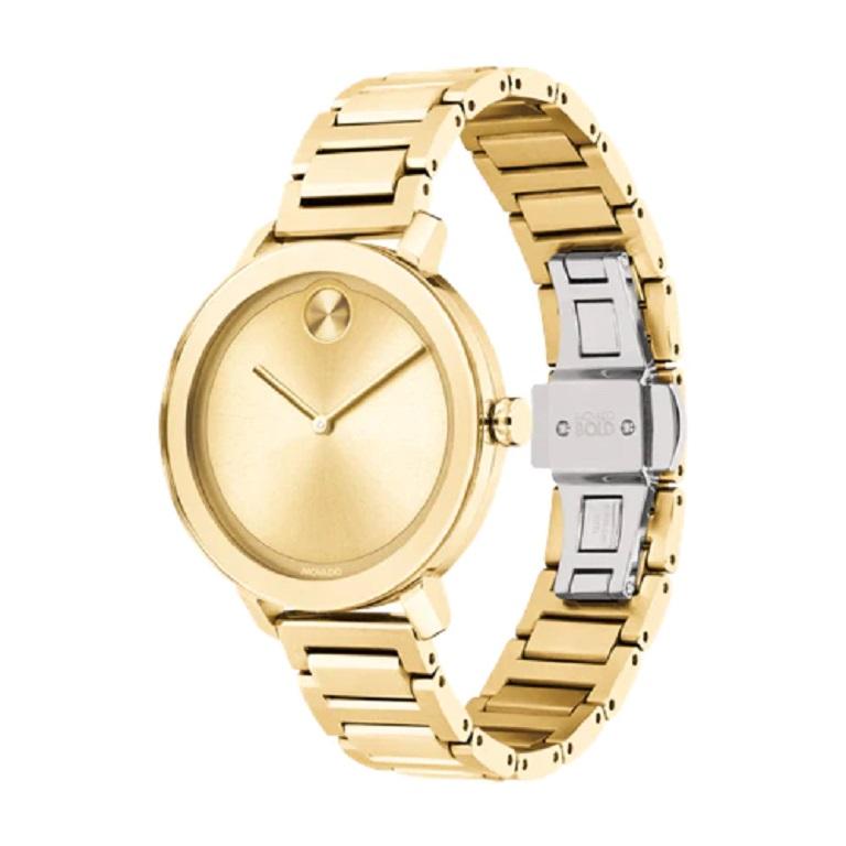A gold-tone monochromatic design gives this women's Movado BOLD Evolution watch both edge and style. The watch features a thin 34mm gold-tone ion-plated stainless steel case, K1 crystal, and gold sunray dial and hands with gold-tone sunray dot at 12