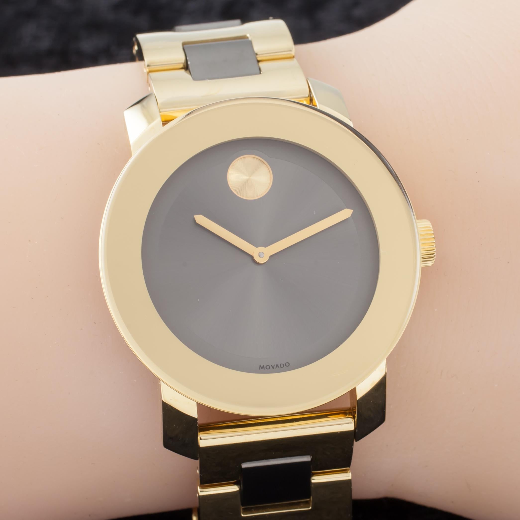 Model: Movado Bold
Model #MB.01.3.34.6038
Gold Plated Case
36 mm in Diameter (38 mm w/ Crown)
Lug-to-Lug Distance = 43 mm
Lug-to-Lug Width = 18 mm
Thickness = 10 mm
Gray Dial w/ Gold Hands and Trademark Moon Symbol at 12:00
27 mm in Diameter
Gold