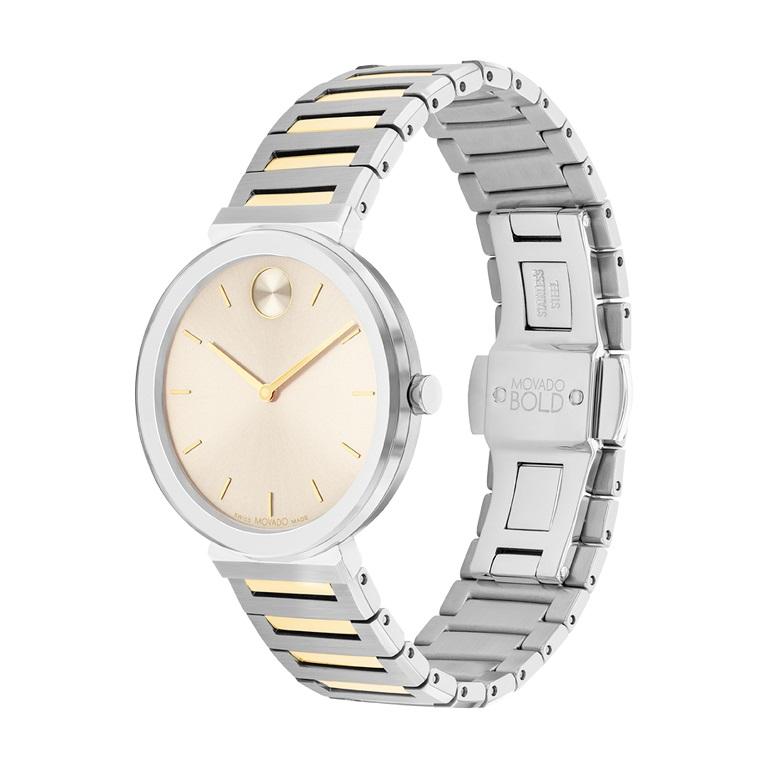 Movado Bold Horizon 34mm Taupe Dial Two-Tone Stainless Steel Watch 3601091

Refining sleek, contemporary style in an ultra-thin design. The 34mm case of this sophisticated watch is only 6.5mm thick, creating a super sleek silhouette. This two-tone