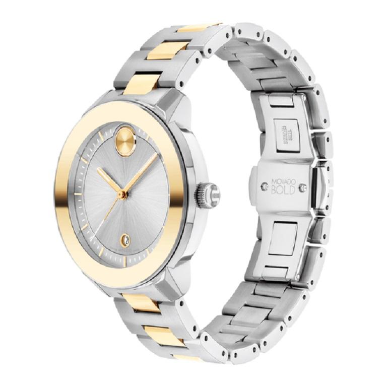 Movado Bold Verso Two Tone 38mm Silver Dial Stainless Steel Ladies Watch 3600749

Movado BOLD Verso, 38mm stainless steel and pale yellow gold ion-plated case and bracelet with silver-toned dial. Features pale yellow gold-toned accents, date window