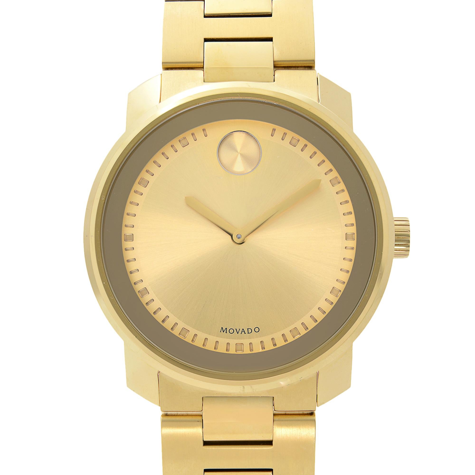 Pre-owned Movado Bold 3600258. The Watch has Hairline Scratches. This Beautiful Timepiece Features: Yellow Gold Ion-Plated Stainless Steel Case and Bracelet. Fixed Gold-Tone Stainless Steel Yellow Gold Ion-Plated Bezel. Champagne Dial with Yellow