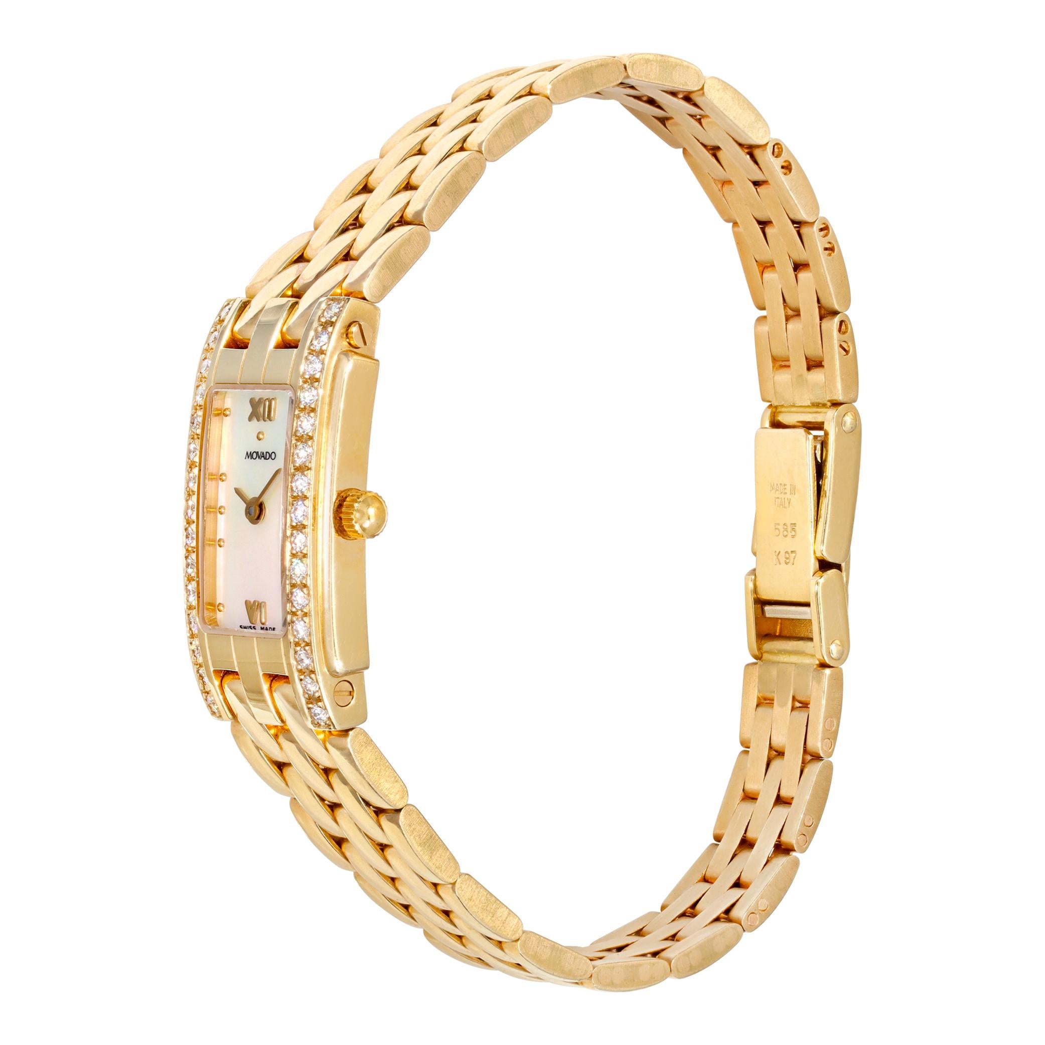 Movado Classic in 18k yellow gold with Mother of pearl dial and diamond shoulders. Quartz. 14 mm case size. Ref 73 16 9697. Fine Pre-owned Movado Watch.

 Certified preowned Dress Movado Classic 73 16 9697 watch is made out of yellow gold on a 18k