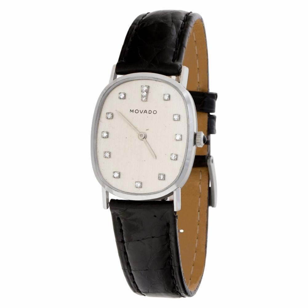 Vintage Movado with original diamond dial and cabochon sapphire crown in 14k white gold on leather strap with 14k white gold buckle. Manual. 27 mm case size. With pouch. Circa 1920s.Ref 5120. Fine Pre-owned Movado Watch. Certified preowned Vintage