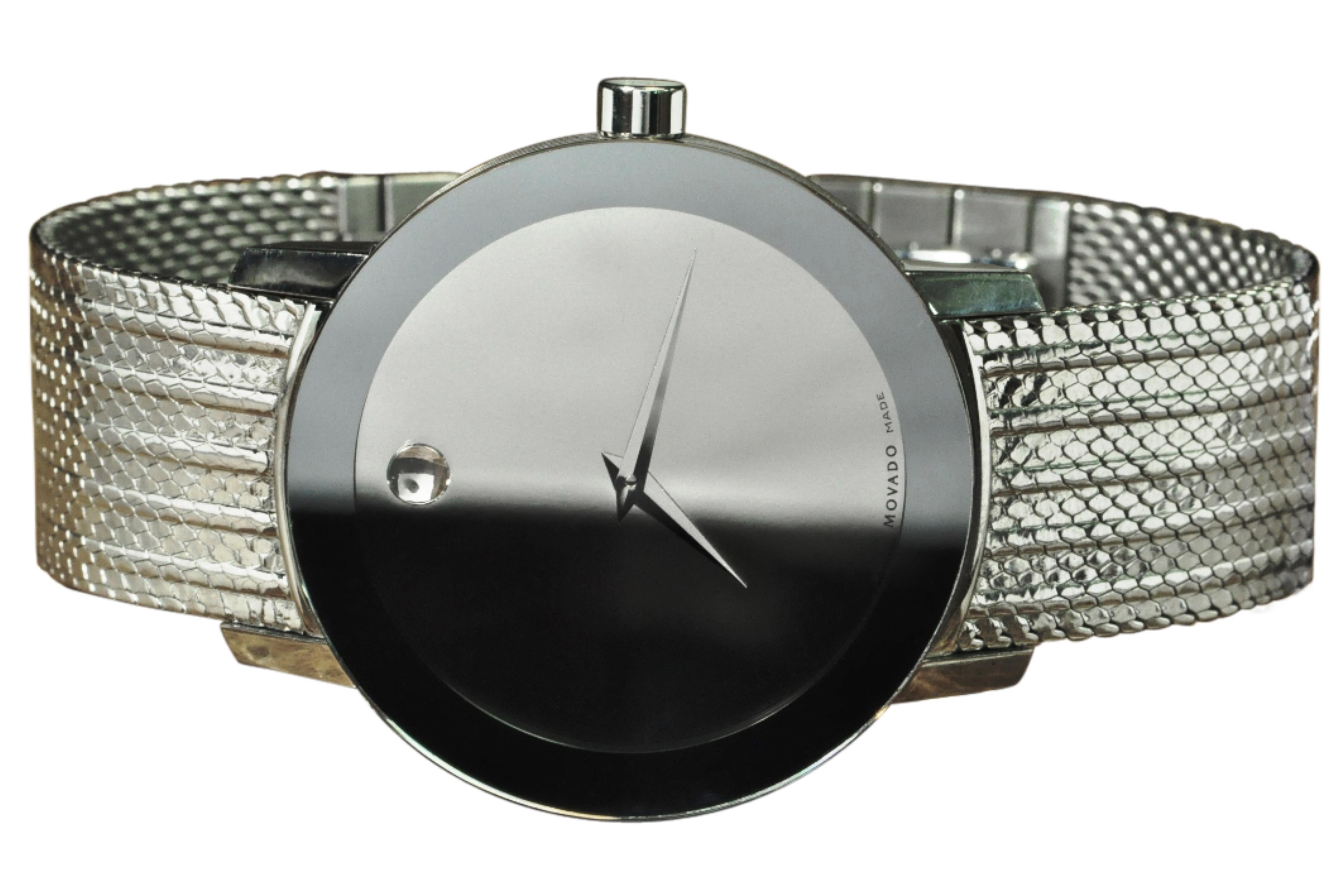 This captivating Movado Concept 60 men’s watch is powered by a Swiss Quartz movement encased in a stainless-steel body. The clasp of the watch utilizes a dual pushbutton deployment clasp for secure opening and closing. The round watch face is
