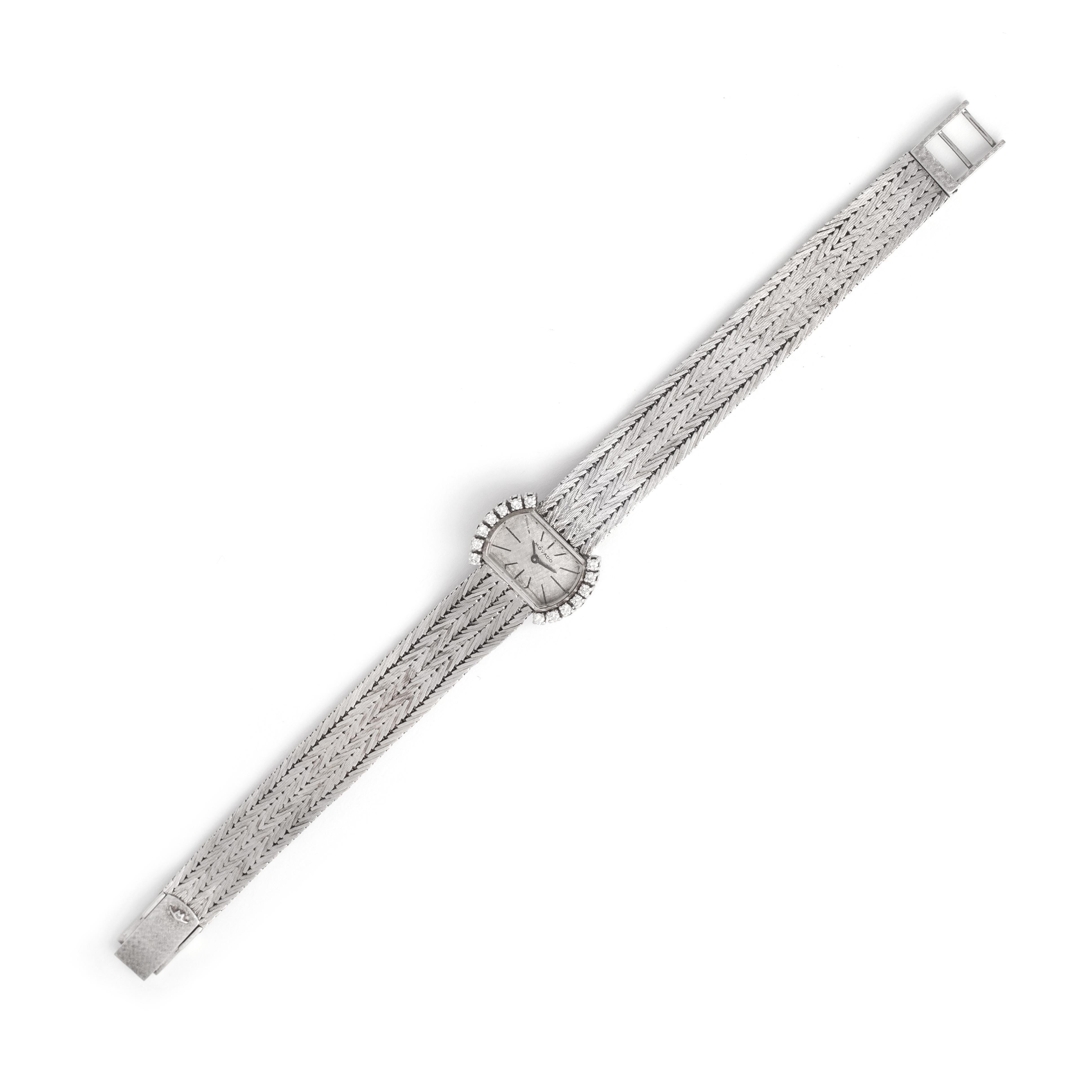 Movado Diamond White Gold Wristwatch.
Circa 1970.
Wrist length: approx. 18.00 centimeters.
Case dimensions: 1.70 x 0.90 centimeters.
Weight: 31.88 grams.

We do not guarantee the movement is working.
