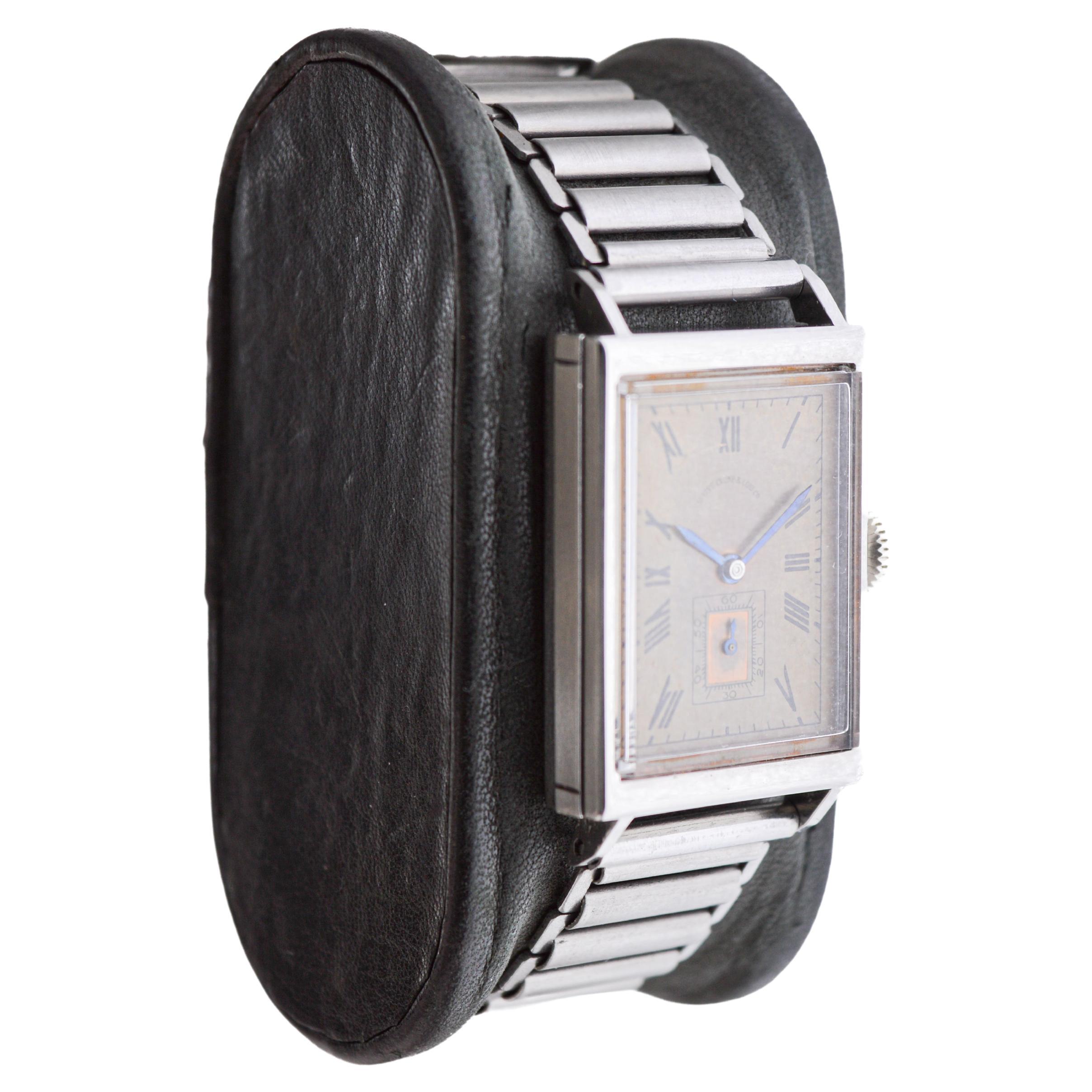 FACTORY / HOUSE:  Movado Watch Company for Shreve Crump & Low Co.
STYLE / REFERENCE: Art Deco / Tank Style 
METAL / MATERIAL: Stainless Steel
CIRCA / YEAR: 1930's
DIMENSIONS / SIZE: Length 38mm X Width 23mm
MOVEMENT / CALIBER: Manual Winding / 17