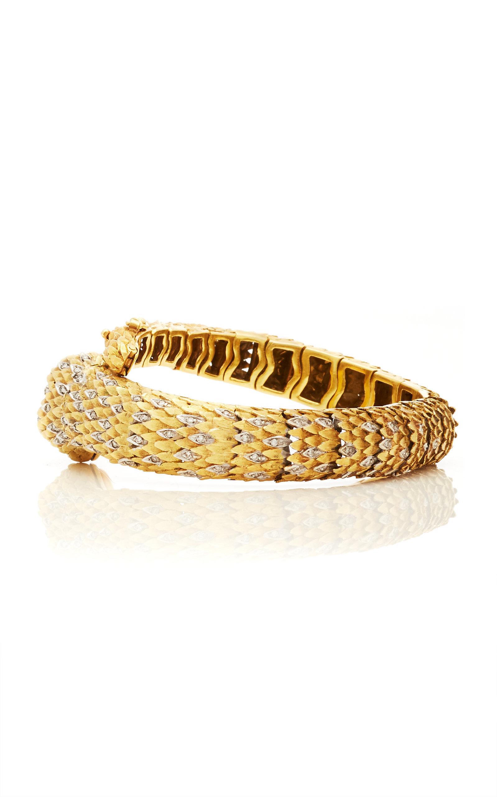 Montre-bracelet serpent en or avec diamants et émeraudes de Movado Unisexe en vente