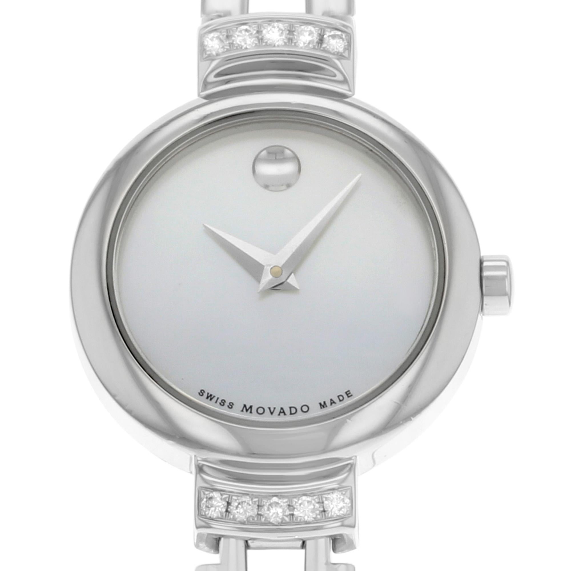 This display model Movado Harmony 0606353 is a beautiful Ladies timepiece that is powered by a quartz movement which is cased in a stainless steel case. It has a round shape face, diamonds dial and has hand unspecified style markers. It is completed