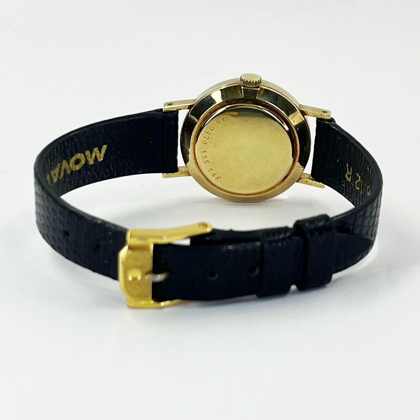 Women's Movado ladies yellow gold manual watch