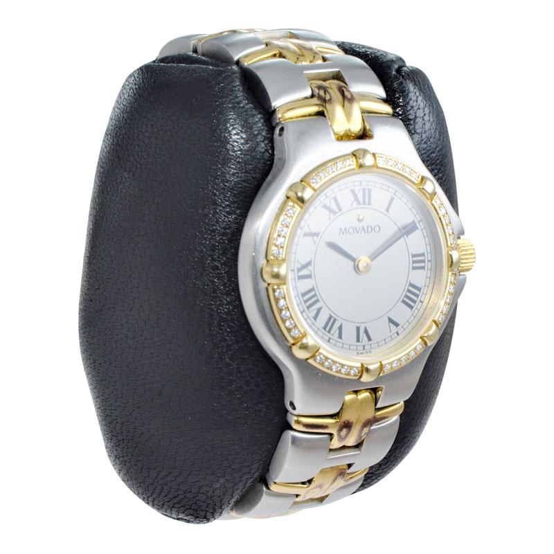 FACTORY / HOUSE: Movado Watch Co.
STYLE / REFERENCE: Ladies Bracelet Dress Style
METAL / MATERIAL: 2 Tone Steel and 18Kt. Yellow Gold
CIRCA / YEAR: 1990's
DIMENSIONS / SIZE: Length 30mm x Diameter 28mm
MOVEMENT / CALIBER: Quartz 
DIAL / HANDS: