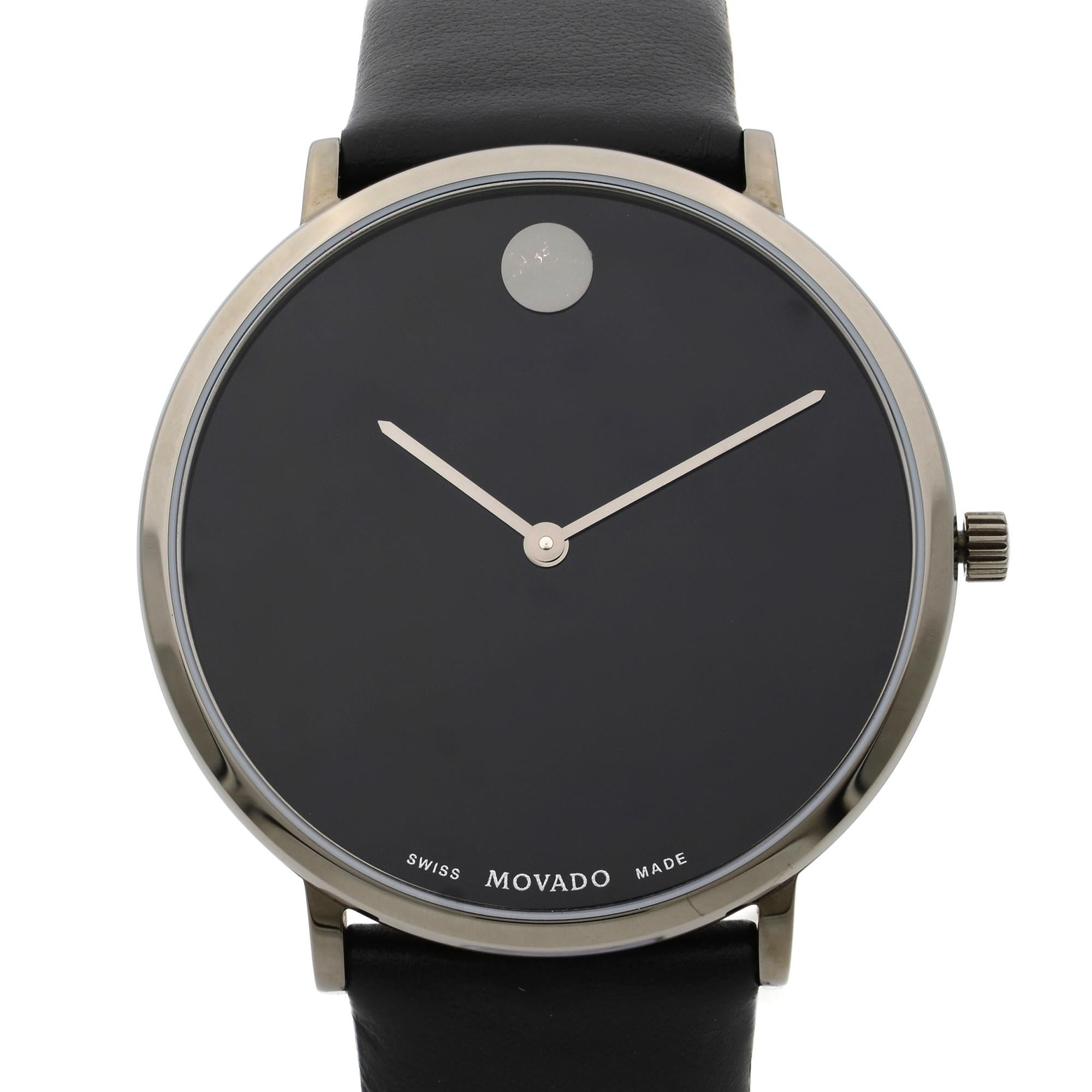 This pre-owned Movado Modern 47 0607391 is a beautiful men's timepiece that is powered by quartz (battery) movement which is cased in a stainless steel case. It has a round shape face, no features dial and has hand unspecified style markers. It is