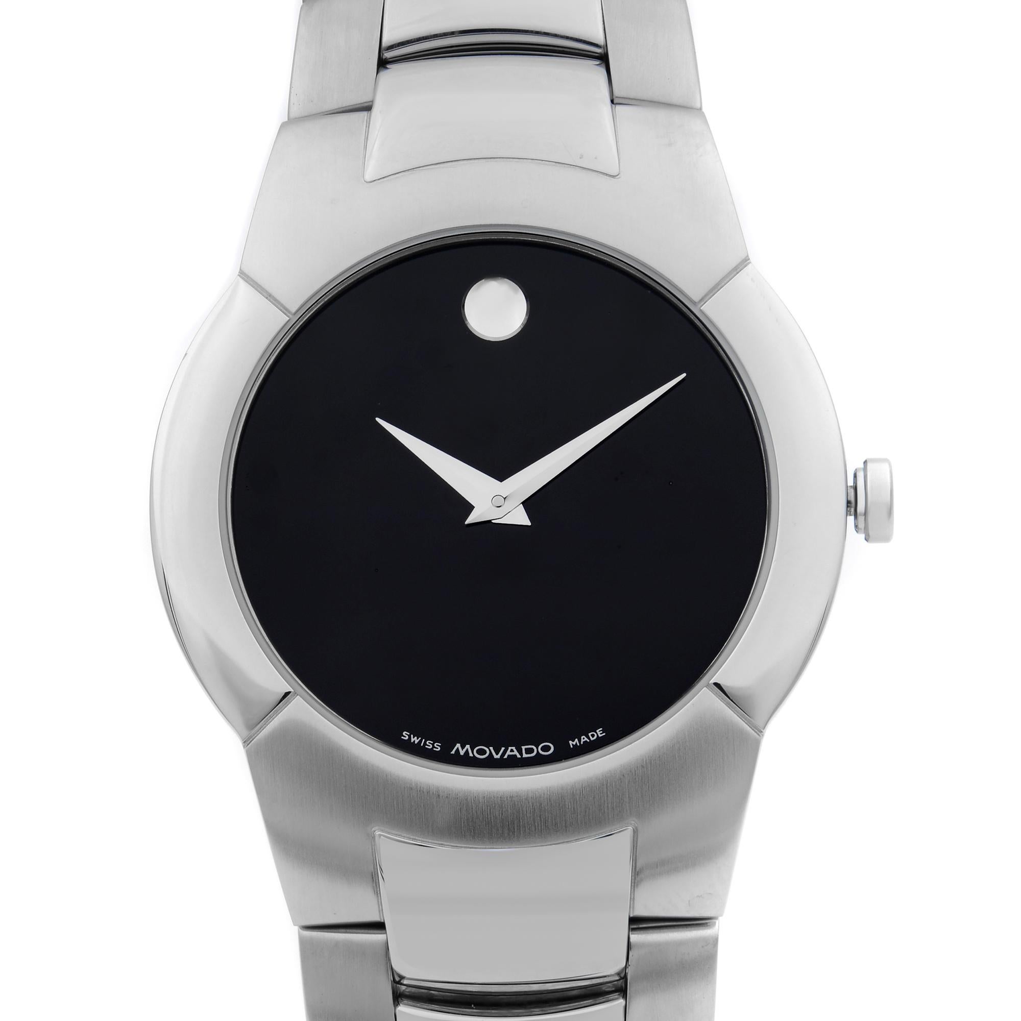 This display model Movado Monto 84 G1 1897 is a beautiful men's timepiece that is powered by quartz (battery) movement which is cased in a stainless steel case. It has a round shape face, no features dial and has hand unspecified style markers. Case