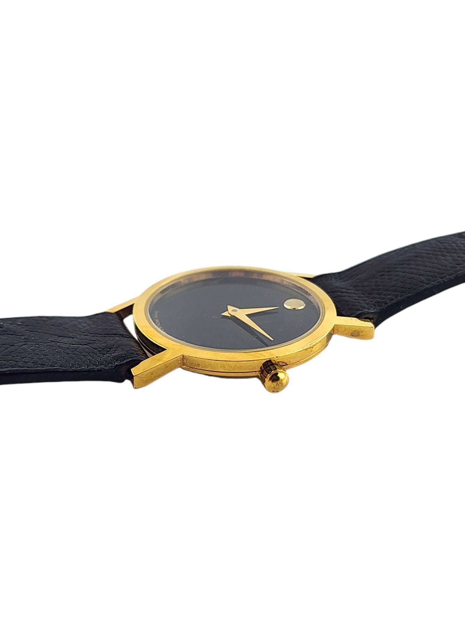 Movado Museum Ladies Watch

Model: 87.A1.832
Serial: 2035735

This petite ladies Movado watch has a 25mm case.

Stainless steel gold plated case, black museum dial

Quartz movement

black leather strap - some wear from use

Watch is approx. 8