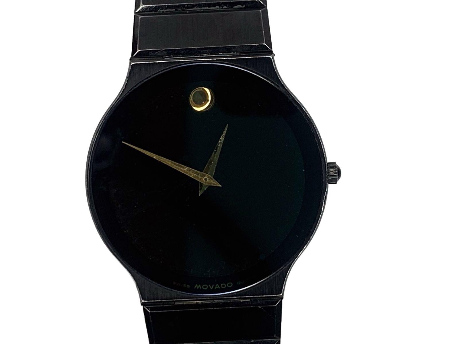 Movado Museum Wristwatch - Ultra Thin Black Dial w/ Gold-Tone Hands & Logo

ITEM DESCRIPTION: 
One beautiful Movado wristwatch in the rare Museum model. The watch is all black ceramic, and features a black dial with accented gold hands and the gold