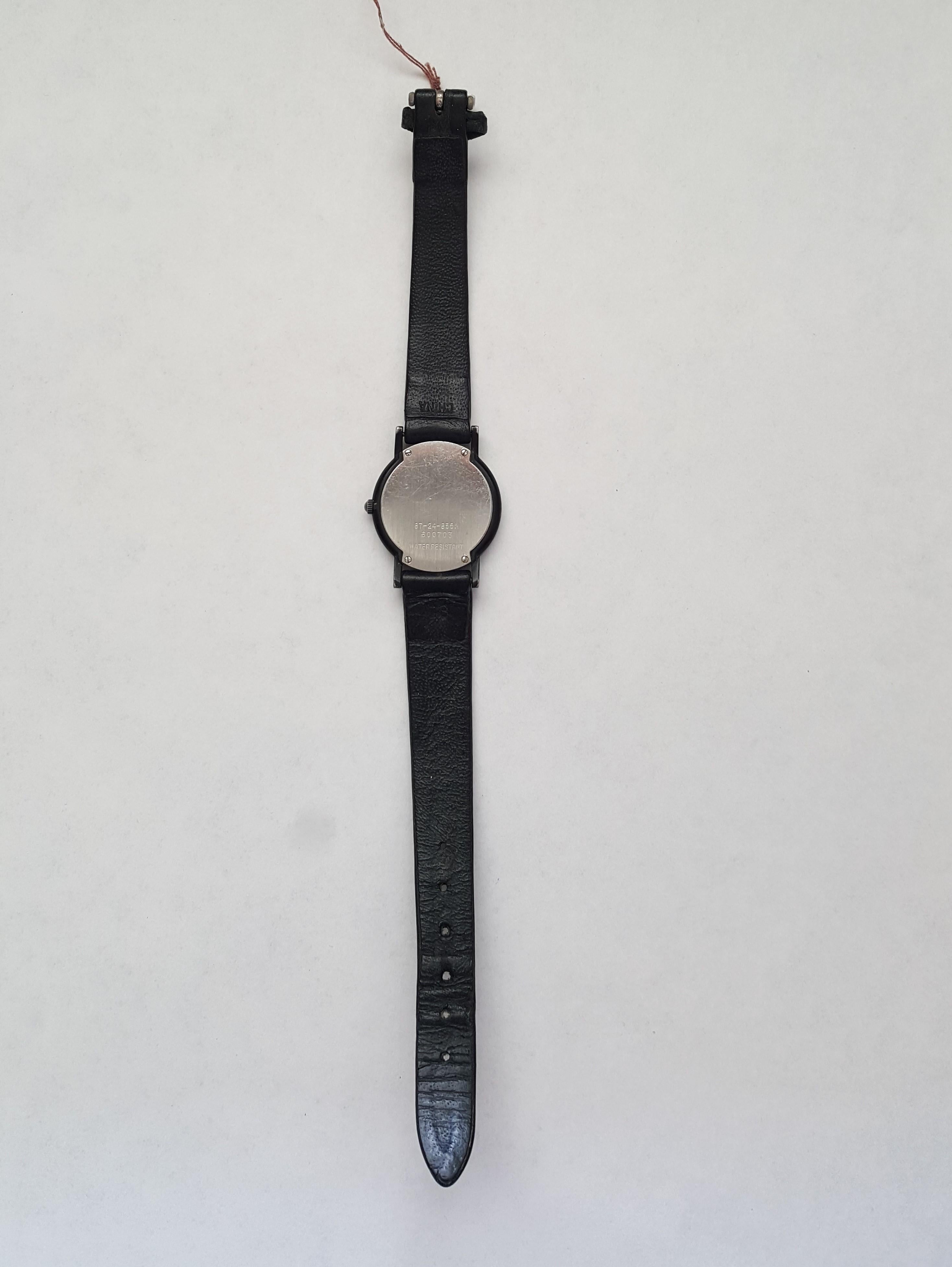 Movado Museum watch black dial with a quartz movement. The case is 24mm in diameter, 4 mm in thickness and the bracelet is 4 inches on the long side and 3 inches on the short side. Comes with original case, water resistant and model number