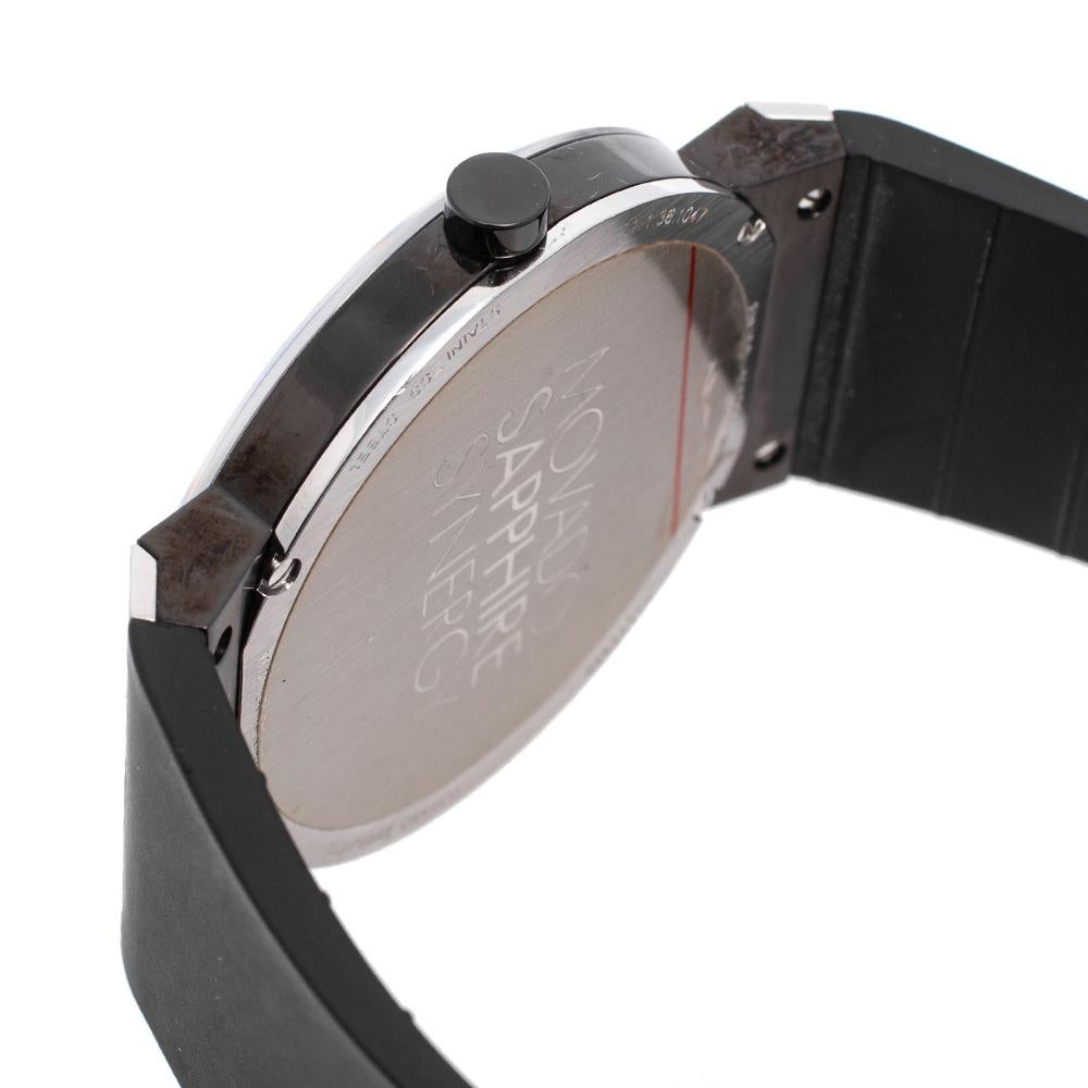 Built to assist you every day, this Movado wristwatch has a black PVD-plated stainless steel case held by rubber straps. It has a black dial with two hands and the signature Movado dot. Water-resistant up to 30 meters and secured by a clasp, this