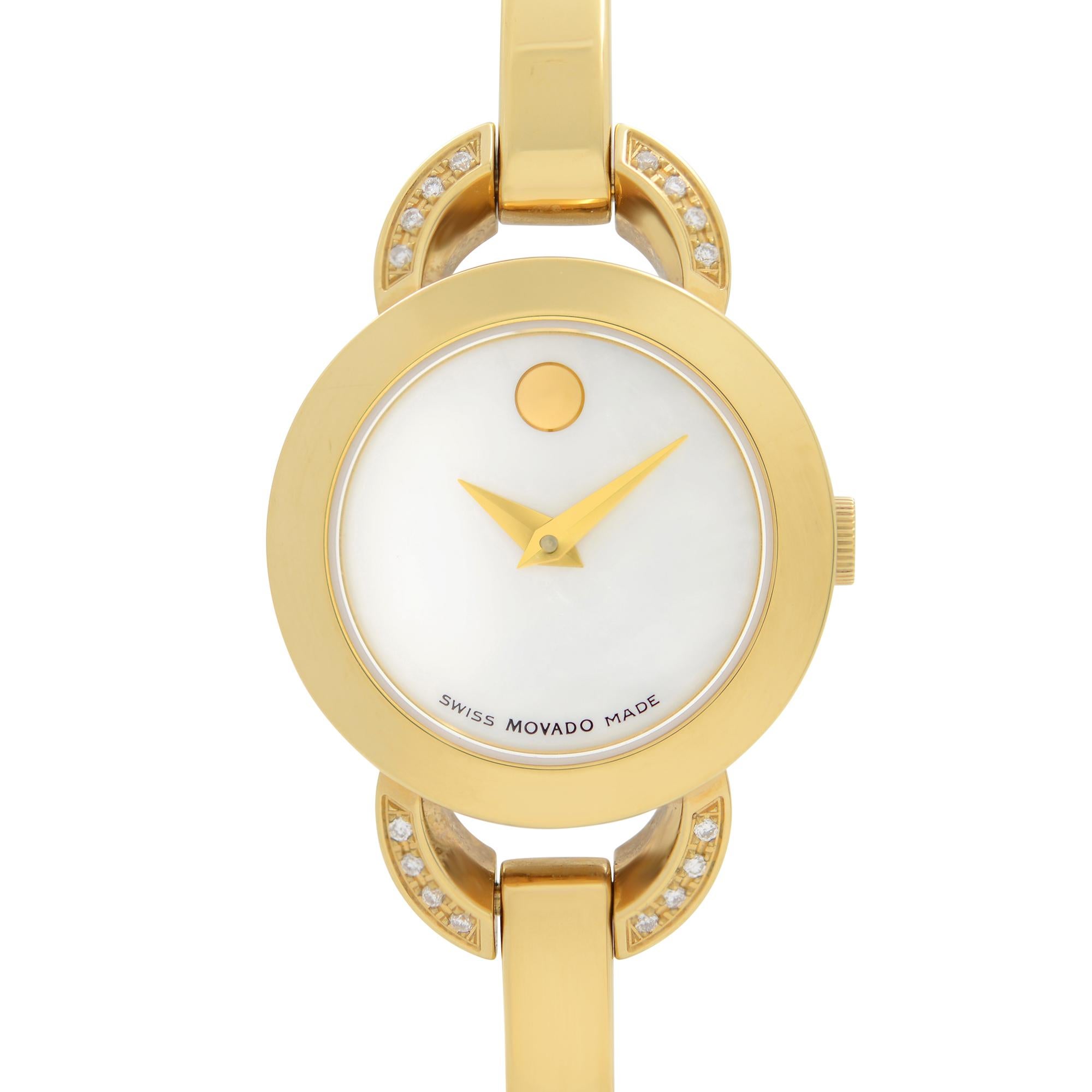 Pre-owned Movado Rondiro Gold-Tone Stainless Steel MOP Dial Quartz Ladies Watch 0606889. The Watch Has Minor Scratches. This Beautiful Timepiece Features: Yellow Gold PVD Stainless Steel Case, Bracelet, and Bezel. White Mother of Pearl Dial with