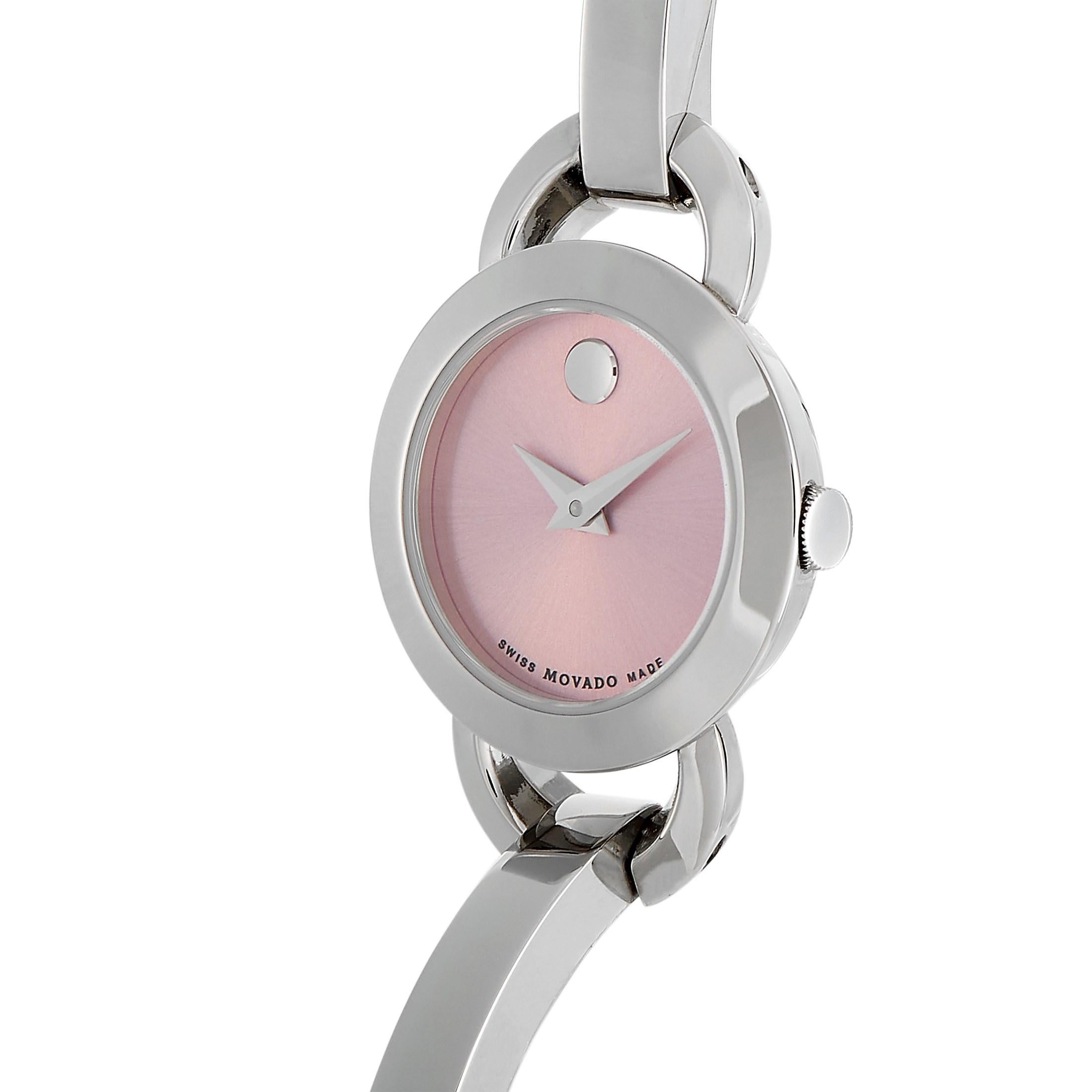 The Movado Rondiro watch, reference number 606797, comes with a stainless steel case that measures 22 mm in diameter. The case is presented on a stainless steel bangle-style bracelet, secured on the wrist with a fold-over clasp. This model is