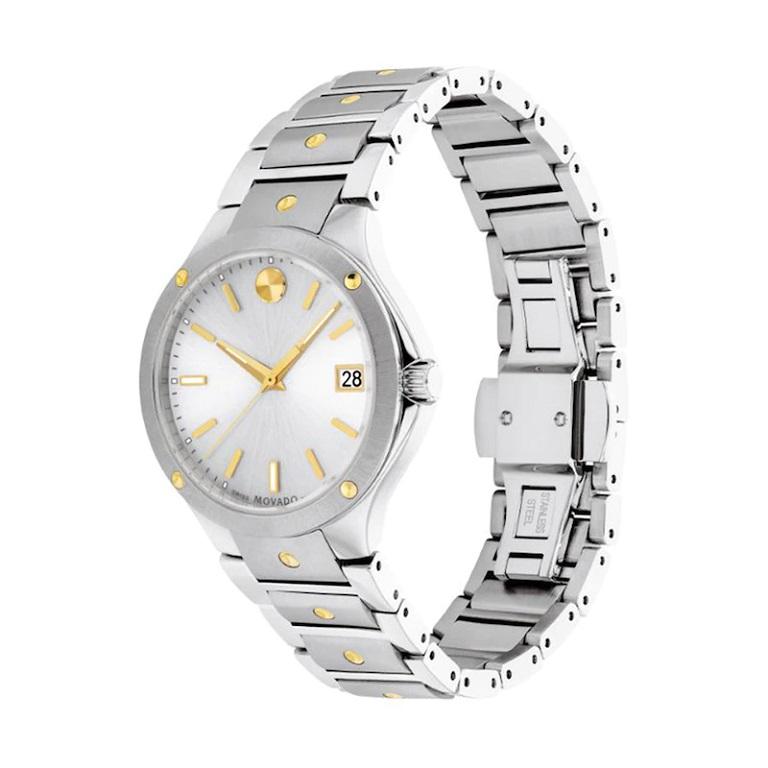 Movado SE 32mm Two Tone Silver Dial Stainless Steel Yellow PVD Watch 607516

Movado SE, 32mm dual finished stainless steel case and bracelet with yellow gold PVD-finished concave polished dot accents and silver white sunray dial. Features Sapphire