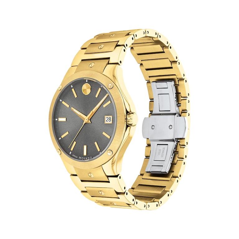 Movado SE 41mm Grey Dial Yellow Gold PVD-finished Stainless Steel Watch 607707

The Movado SE has a 41mm yellow gold PVD-finished case and bracelet with yellow gold-tone PVD concave polished dot accents and a grey sunray dial. Other features include