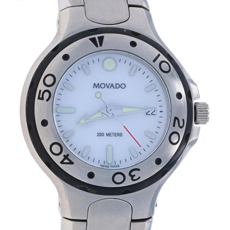 Brand: Movado
Model: Series 800
Model Number: 84.E1.1850
Movement: Quartz
Warranty: One Year
Movement Maker: Swiss
Dial Color: White

Metal Content: Stainless Steel

Fastening Type: Fold-Over Clasp
Features: Date window at the 3 o'clock position Dot