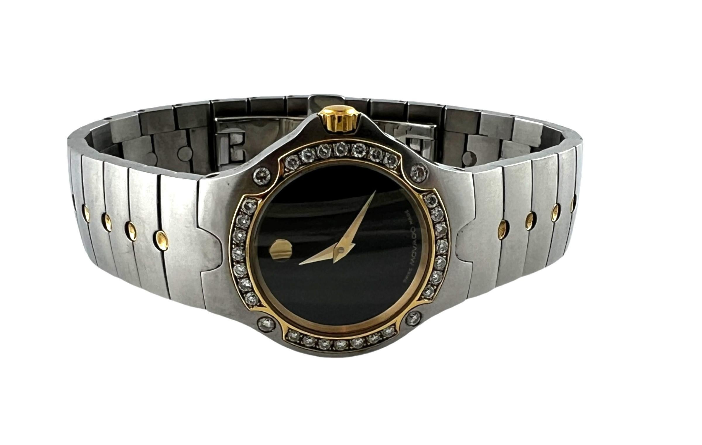 Movado Sports Edition Ladies Watch

Model: 81 G4 1851
Serial: 4895328

Black Dial with gold markers

27mm case

Custom Diamond bezel - diamonds on top and bottom were added after

Two tone - stainless and yellow gold plate

Quartz movement

Fits up