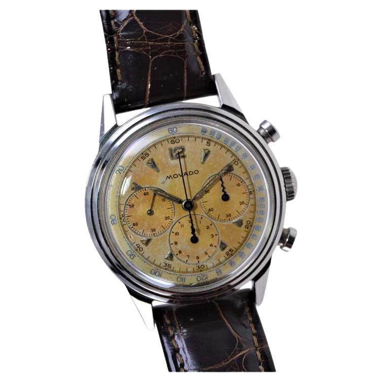 FACTORY / HOUSE: Movado Watch Company
STYLE / REFERENCE: Three Register Chronograph
METAL / MATERIAL: Stainless Steel
CIRCA / YEAR: 1940's
DIMENSIONS / SIZE: Length 42mm x Diameter 34mm
MOVEMENT / CALIBER: Manual Winding / 17 Jewels /