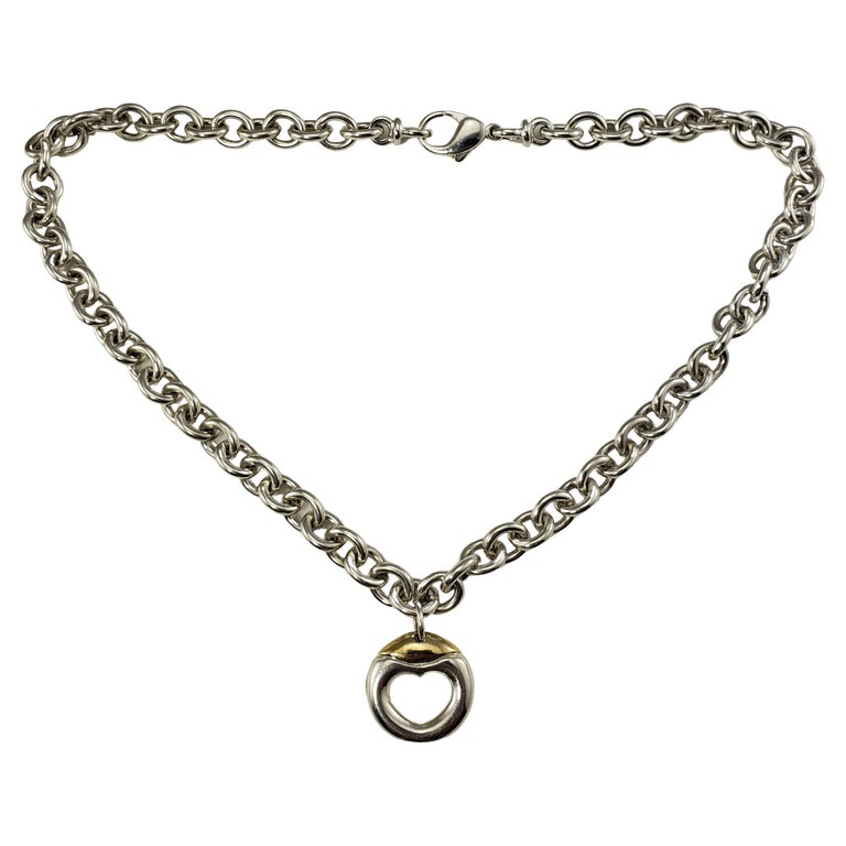 Movado Sterling Silver and 18 Karat Yellow Gold Heart Necklace at