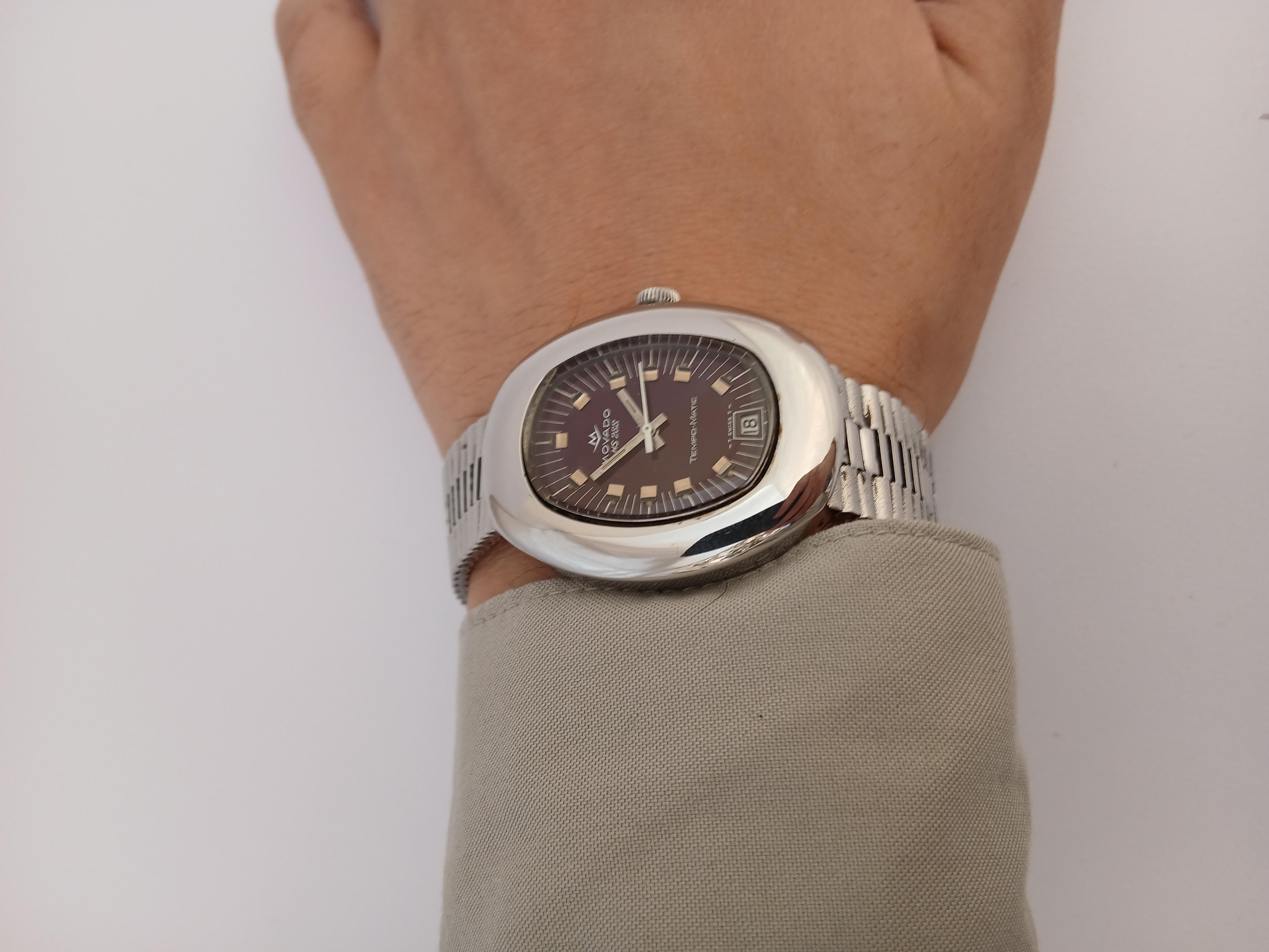  escription
Marke : Movado

Modell: Sub Sea Tempo-matic

Referenznummer: HS 288

Land der Herstellung: Schweiz

Uhrwerk: Automatik

MATERIAL des Gehäuses: Rostfreier Stahl

Abmessungen: 35 mm Durchmesser (ohne Krone) x 43 mm

Band Typ : Rostfreier