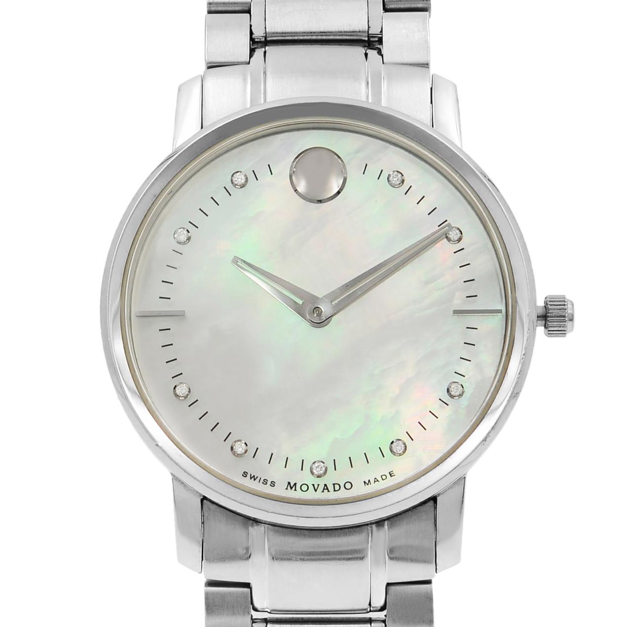 This pre-owned Movado TC 0606691 is a beautiful Ladies timepiece that is powered by a quartz movement which is cased in a stainless steel case. It has a round shape face, diamonds dial and has hand diamonds style markers. It is completed with a