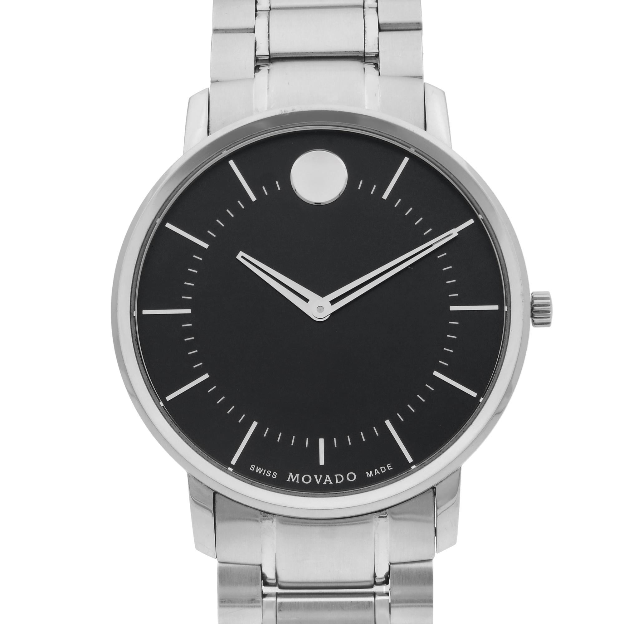 This pre-owned Movado Thin Classic 0606687 is a beautiful men's timepiece that is powered by a quartz movement which is cased in a stainless steel case. It has a round shape face, no features dial and has hand sticks style markers. It is completed