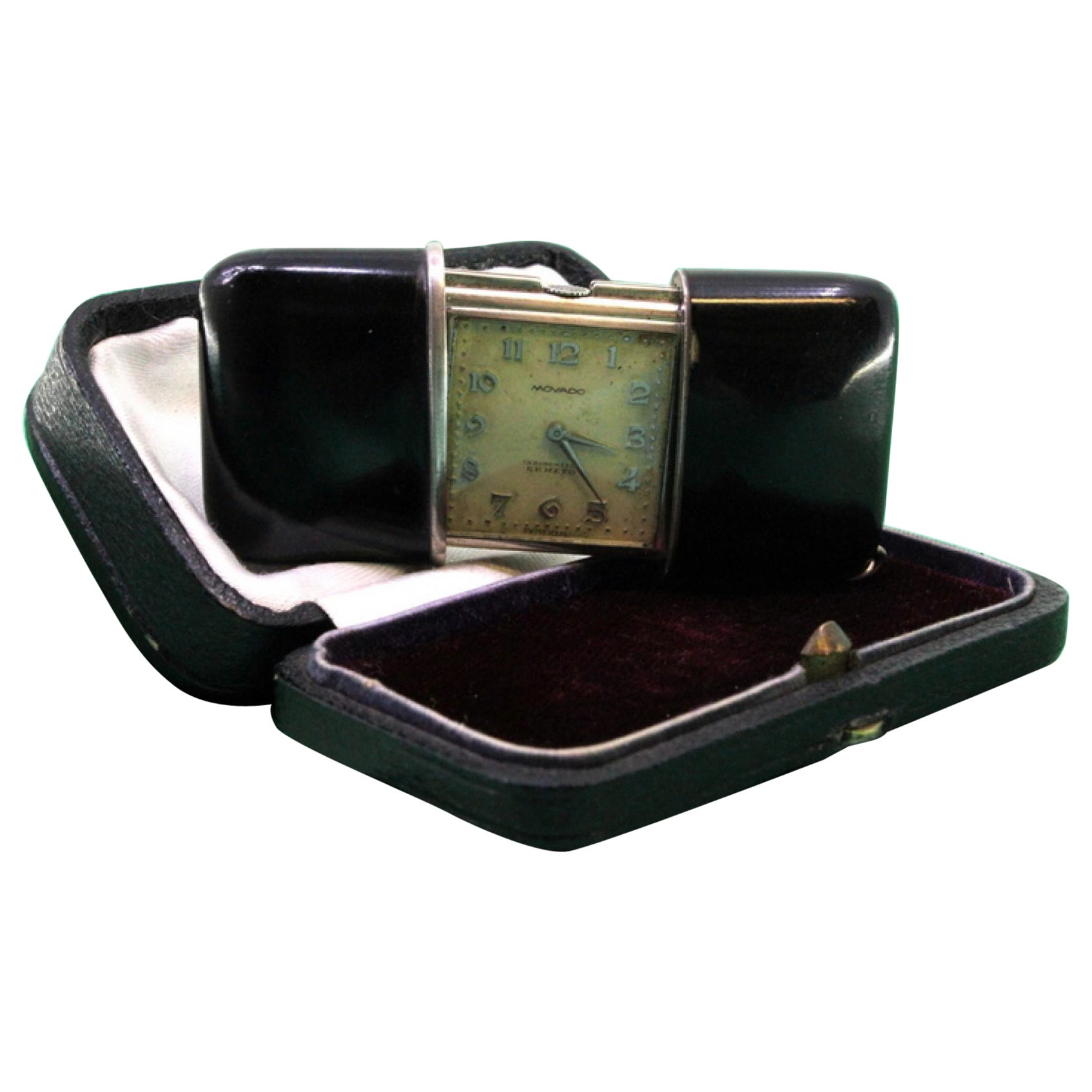 Movado travel watch in silver, mechanical movement with original case