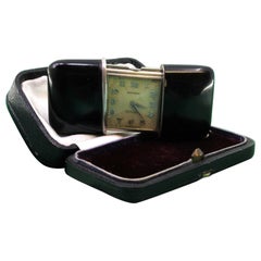 Movado travel watch in silver, mechanical movement with original case