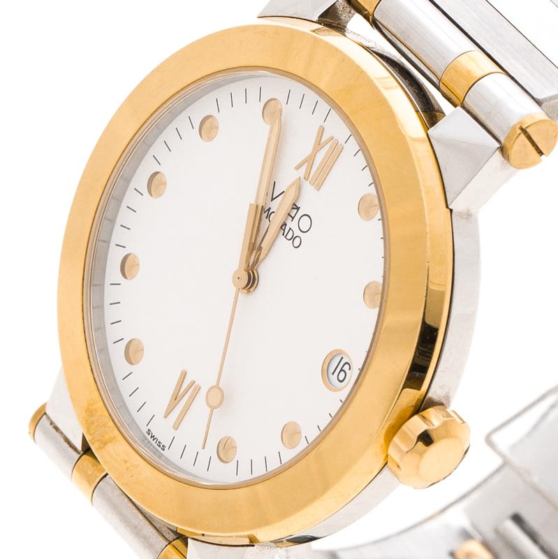 From Movado comes this charming watch that is ideal for everyday use. Swiss made, it has a two-tone metal body and it follows a quartz movement. On the white dial, there are dot hour markers, Arabic numerals at 12 and 6, minute markers around the