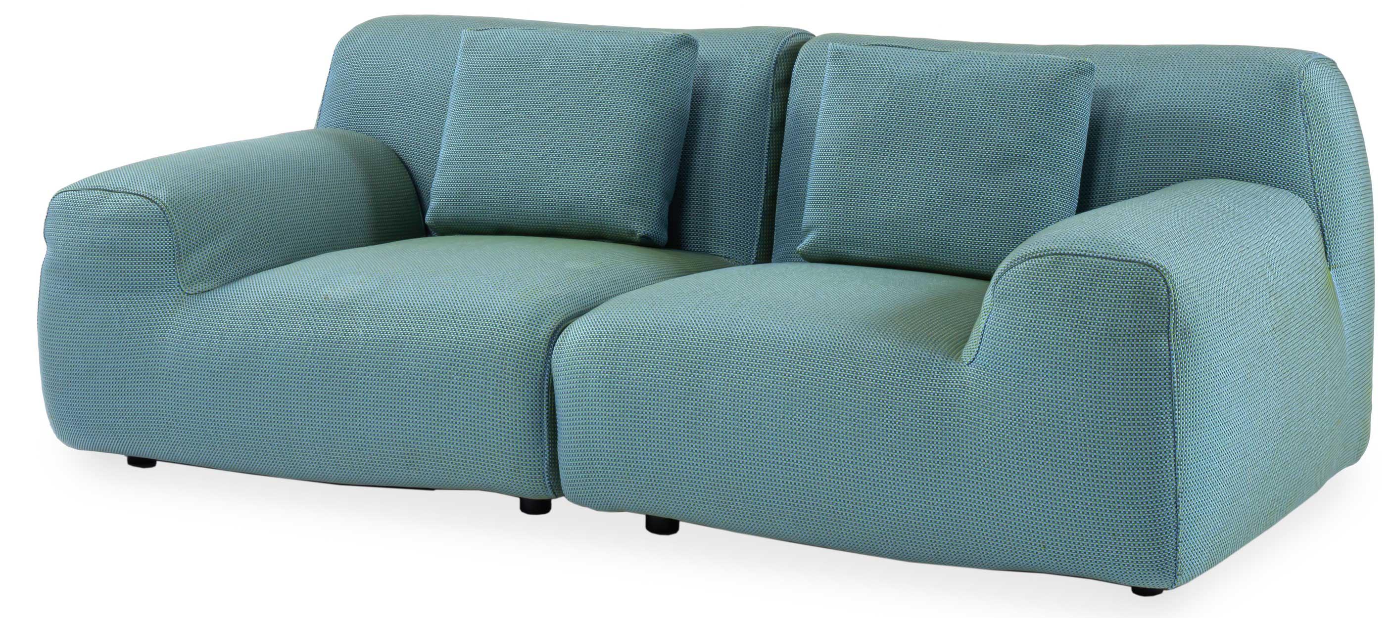 A four-component outdoor sectional set, two with armrest and two without, covered in a weather-safe mixed fabric in blue and green tones. Sectional features a metal base with a weather-safe finish. Sectional can be reconfigured for multiple seating