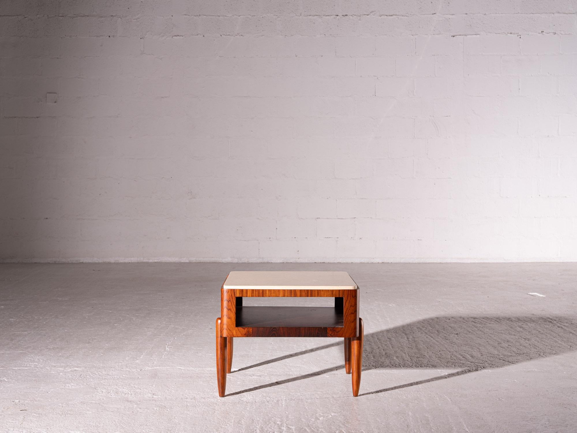 Bertomeu – Square Side Table, c. 1960
Solid wood, veneered wood, and marble
Dimensions: 45 x 55 x 55 cm (17 18/25 x 21 13/20 x 21 13/20 in)

A timeless piece that brings mid-century charm to any interior. This elegant square side table by Bertomeu,