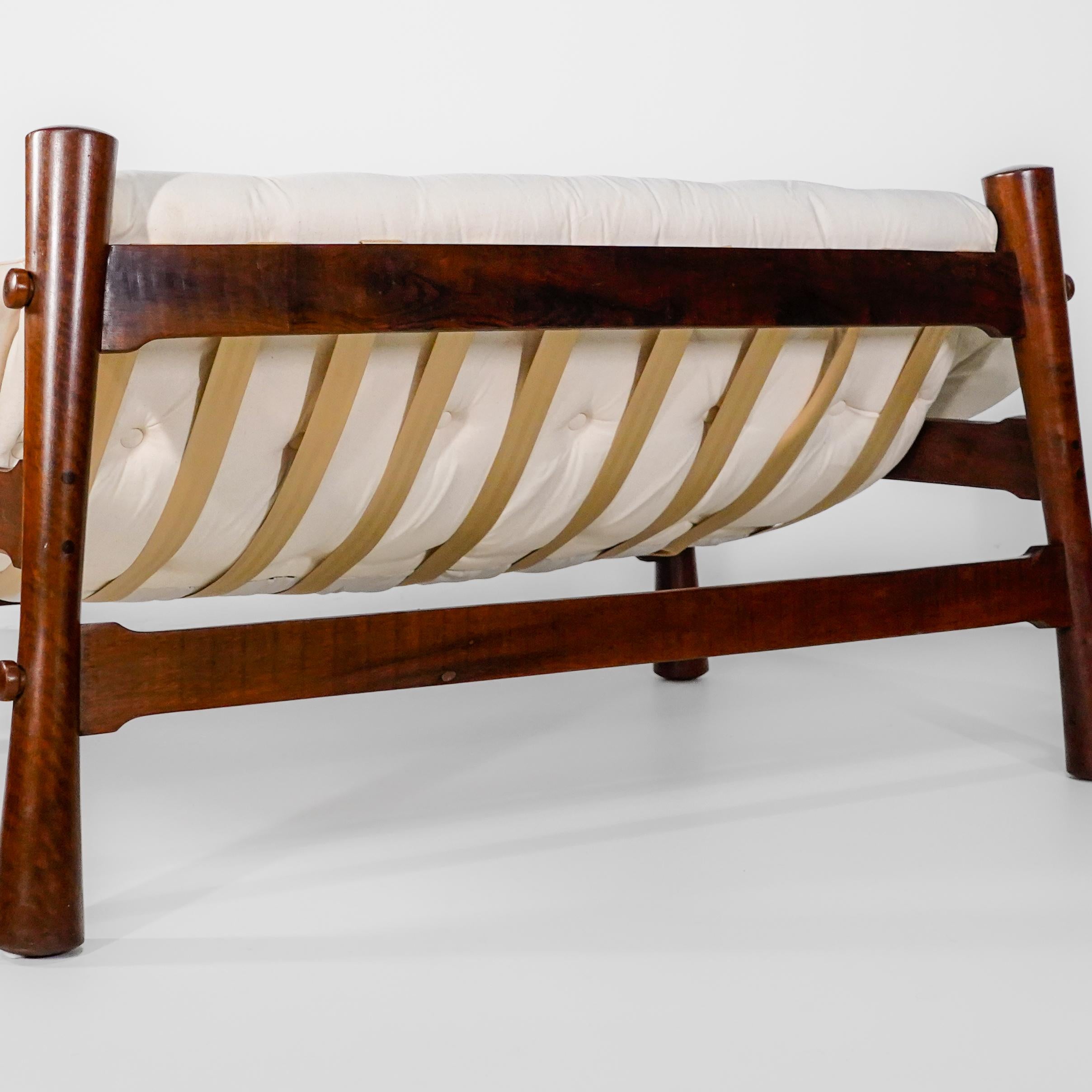 'Móveis Cimo' two-seater Sofa In solid Imbuia wood. Brazil 1960.

The highest historical reference in Brazilian furniture design, Companhia Industrial de Móveis, nicknamed Móveis Cimo, was first created to reuse walnut leftovers from the family