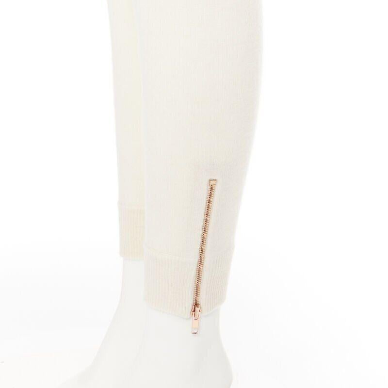 MOVERS & CASHMERE beige white inner mongolian cashmere zip hem legging pants S
Reference: LNKO/A01480
Brand: Movers & Cashmere
Material: Cashmere
Color: Beige
Pattern: Solid
Closure: Zip
Extra Details: Zipper at cuff.
Made in:
