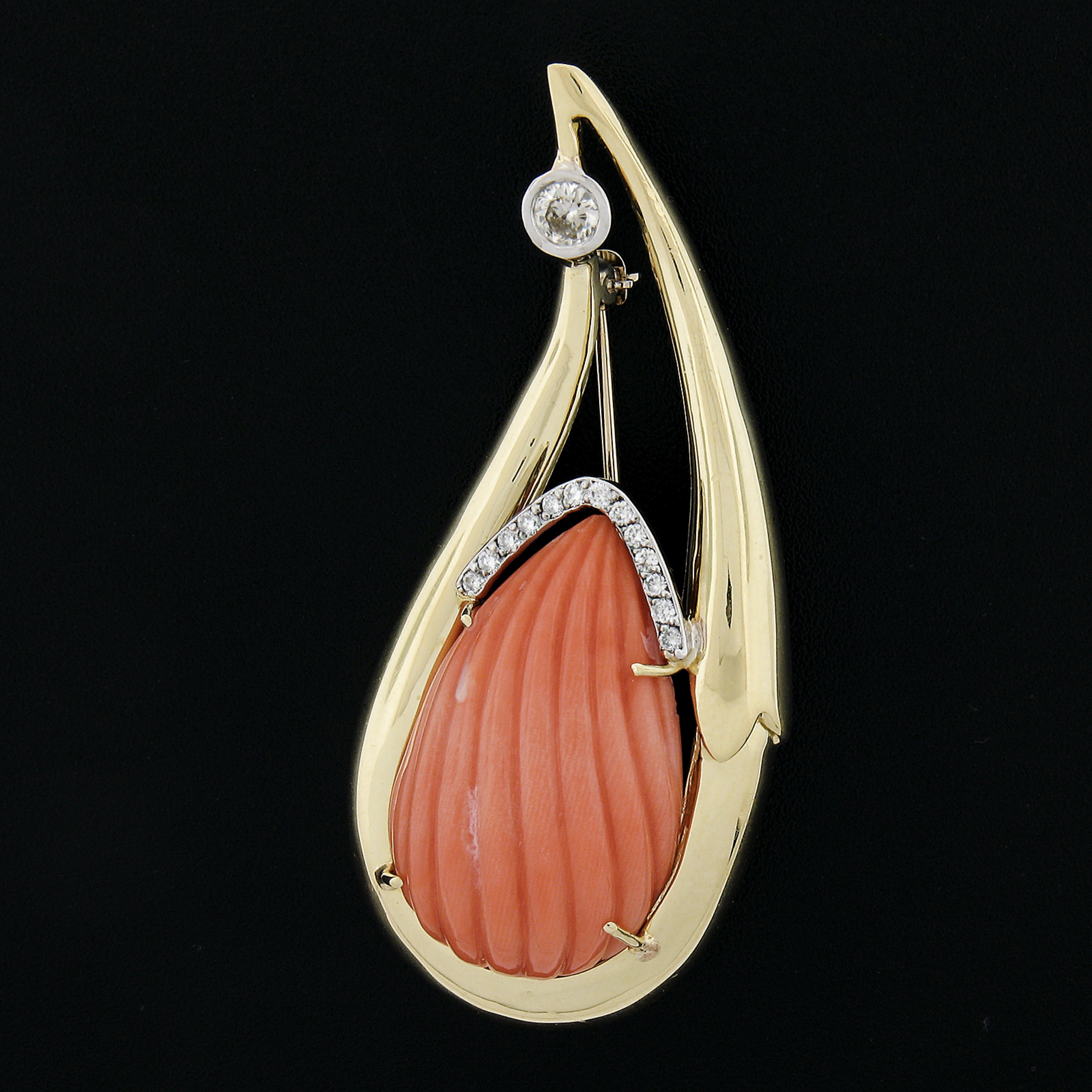 --Stone(s):--
(1) Natural Genuine Carved Corals - Grooved Teardrop Shape - Prong Set - Pink-Orange Color - 29.1x17.8mm (approx.)
(13) Natural Genuine Diamonds - Round Brilliant Cut - Pave Set - 0.15ctw (approx.)
(1) Natural Genuine Diamond - Old
